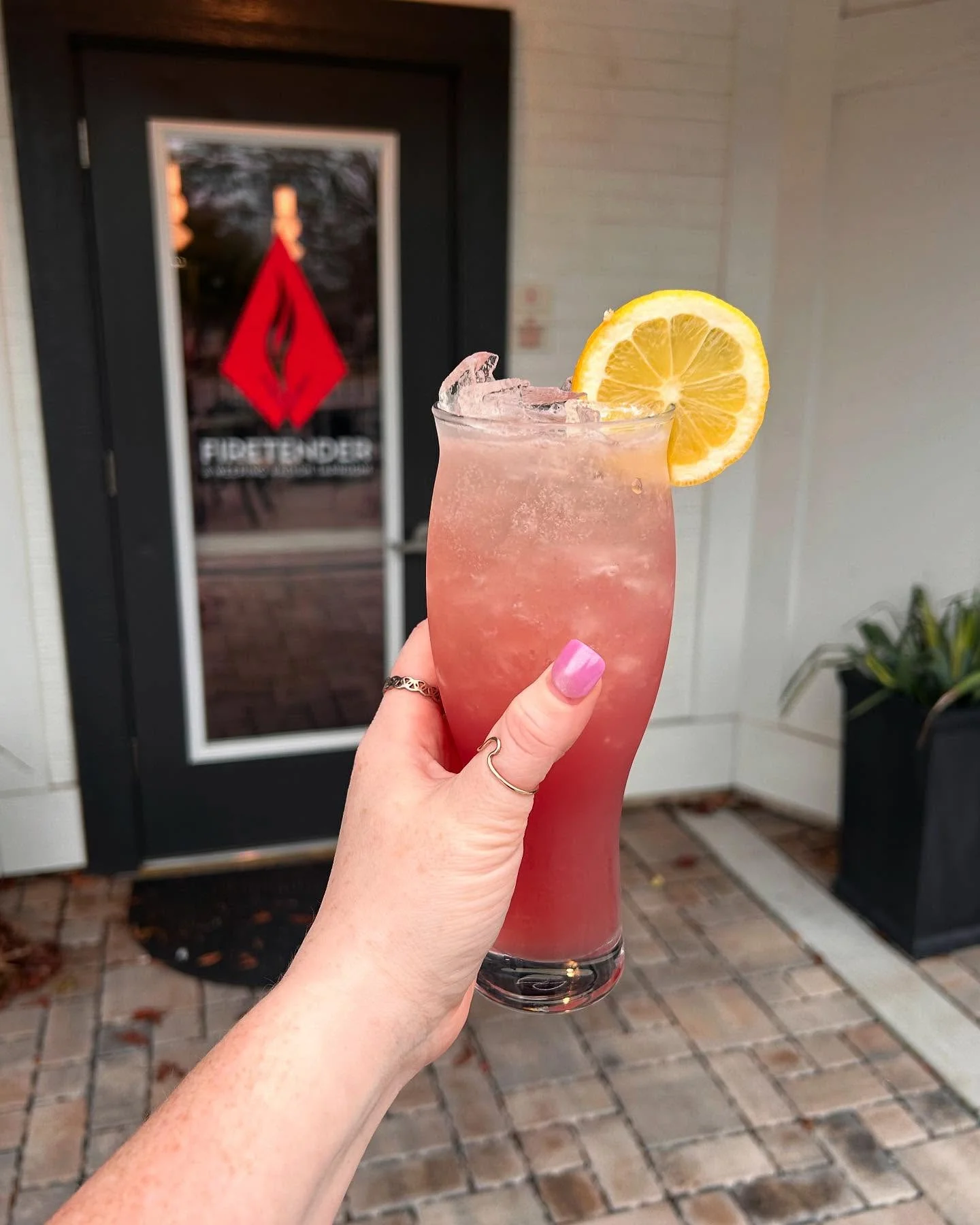 A cocktail outside Firetender in downtown Manteo, NC, a short walk from the Shallowbag Bay waterfront