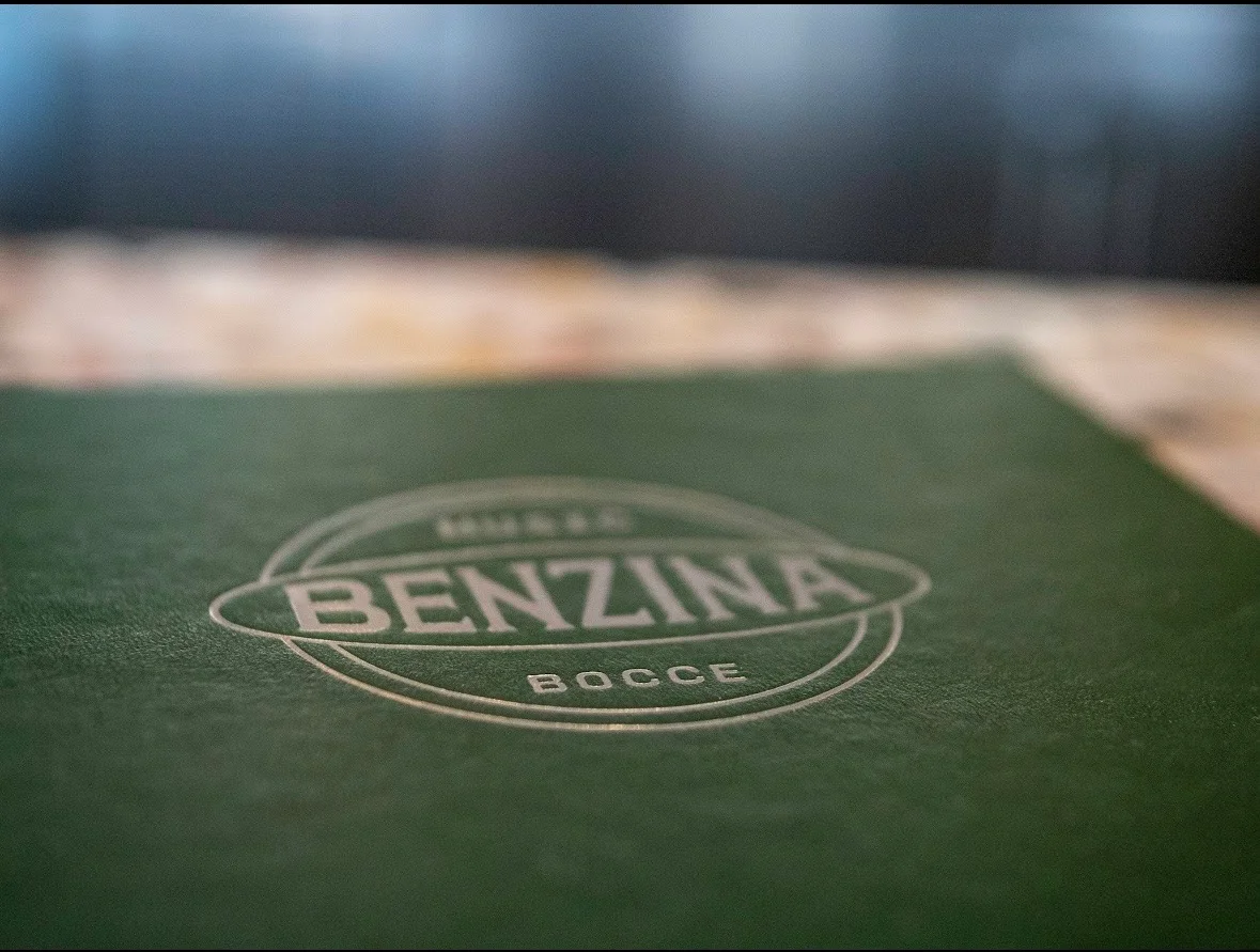 Benzina Bocce restaurant menu cover in green leather