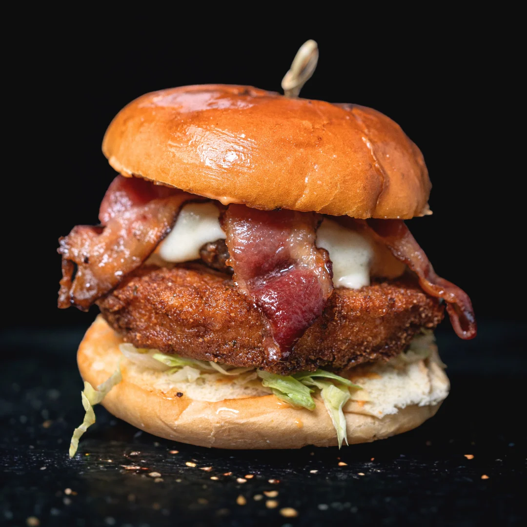 Crispy fried chicken sandwich with bacon
