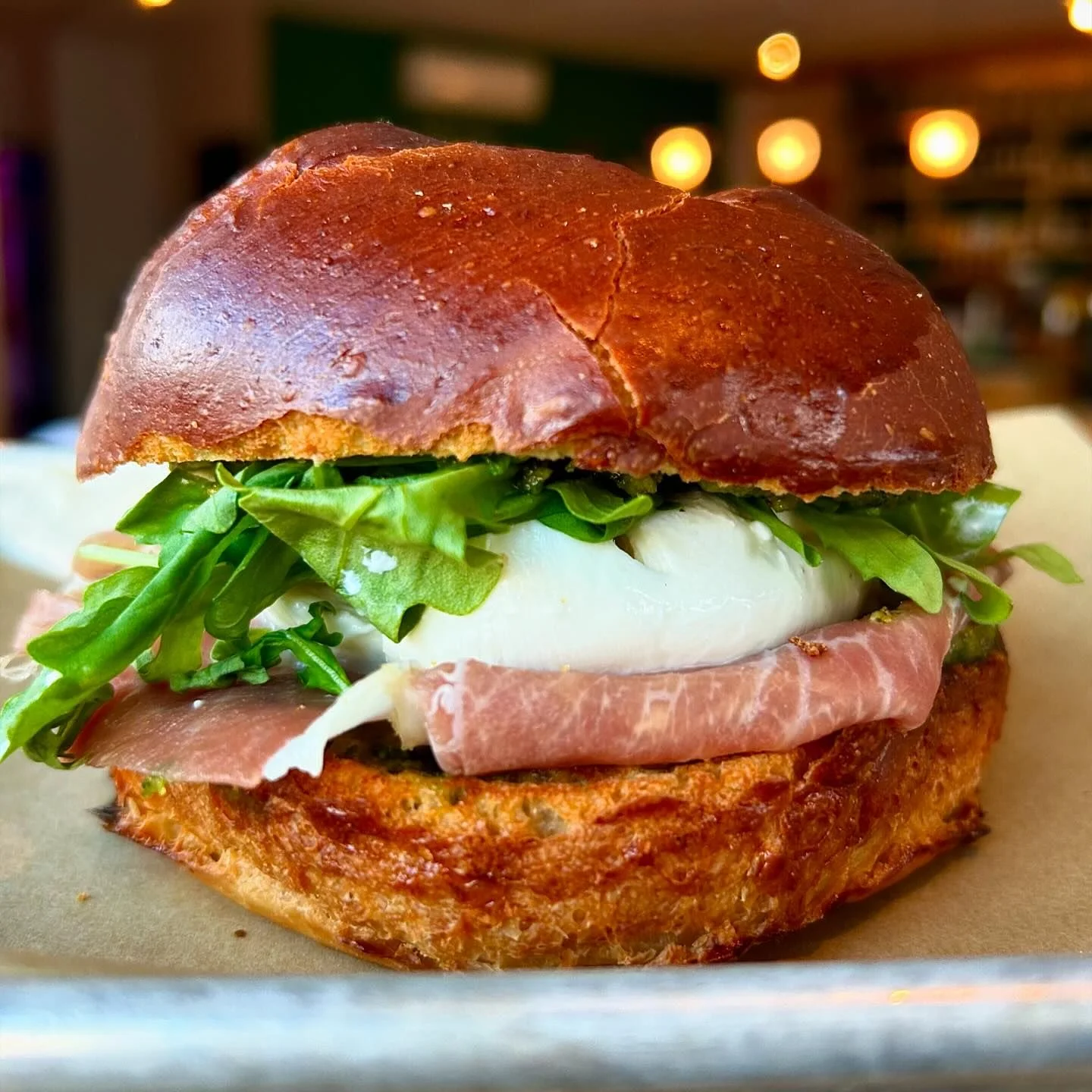 Italian prosciutto sandwich on brioche bun