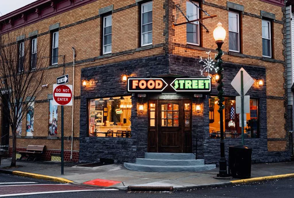 Charming restaurant exterior with warm lighting and inviting entrance