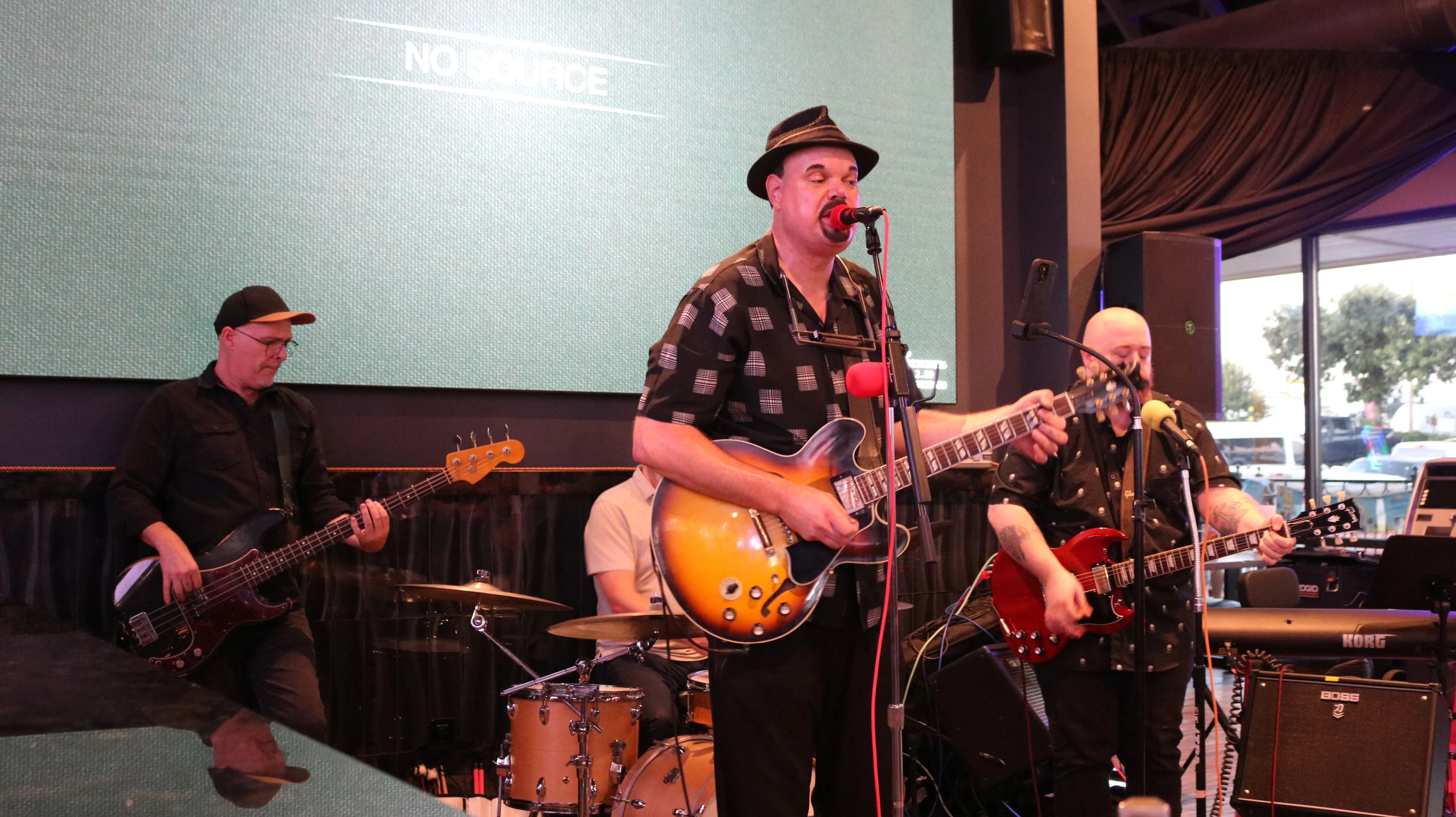 Live band performing at a restaurant with vibrant atmosphere
