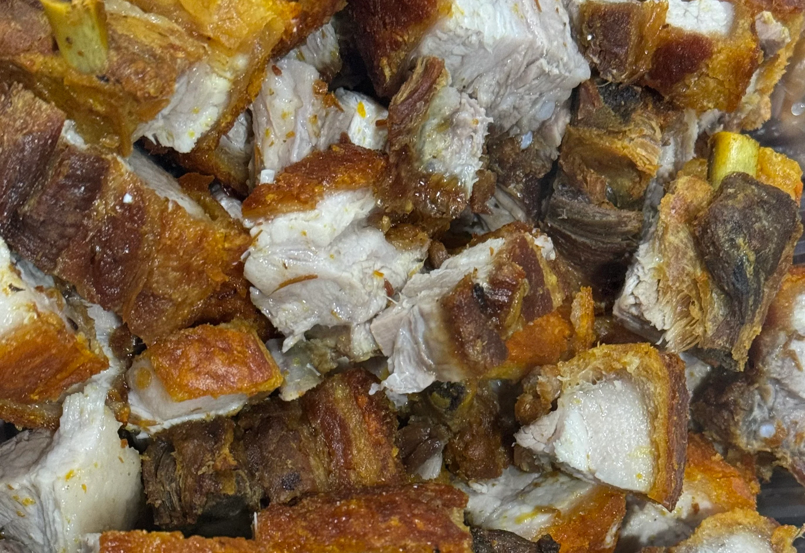 Crispy Filipino lechon kawali pieces served hot