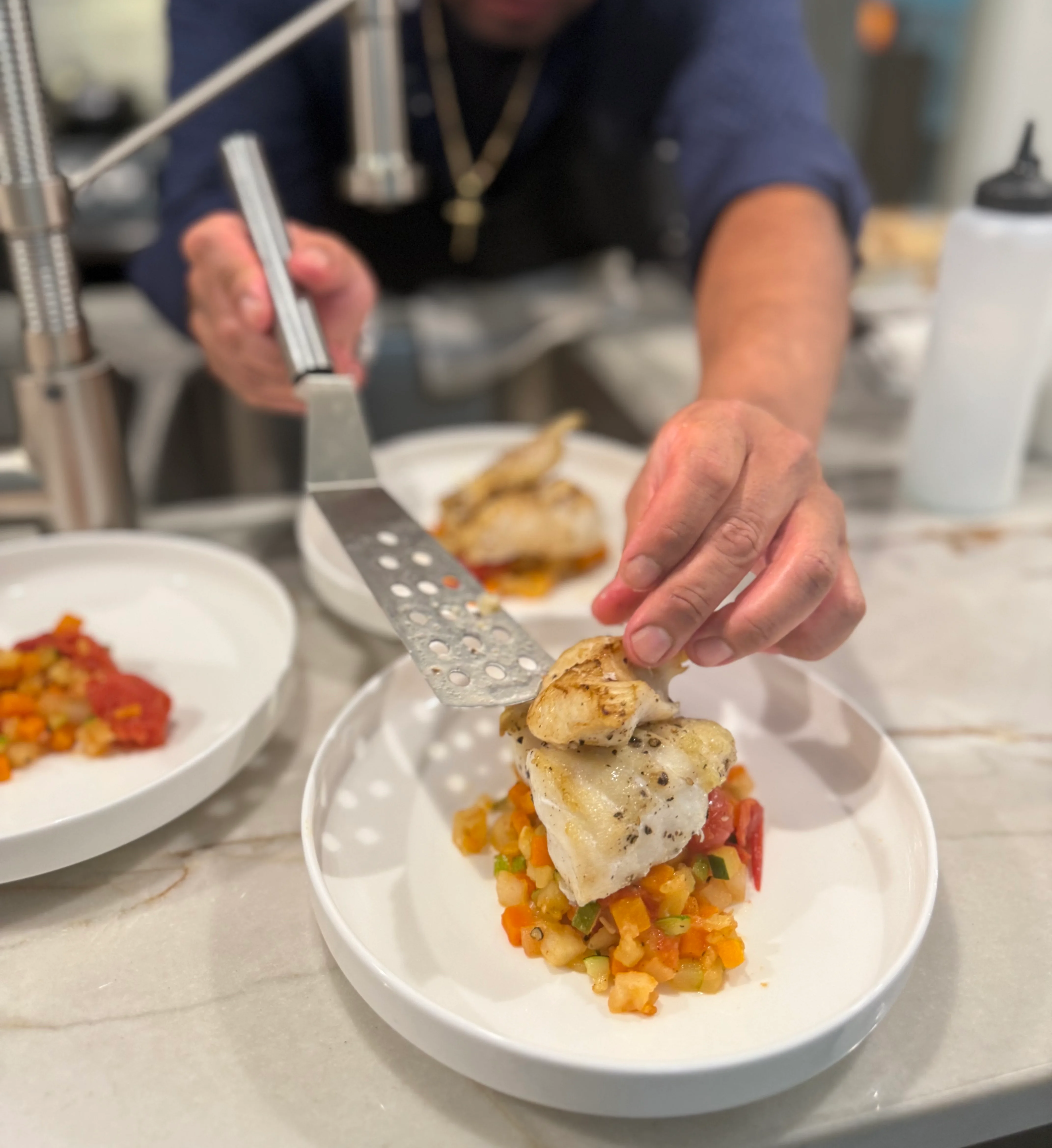Chef plating fish