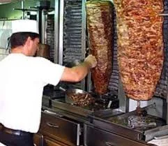 A restaurant chef preparing a dish