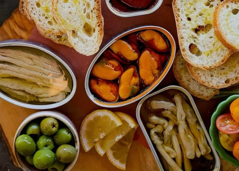 Mediterranean mezze platter with assorted seafood and fresh salad