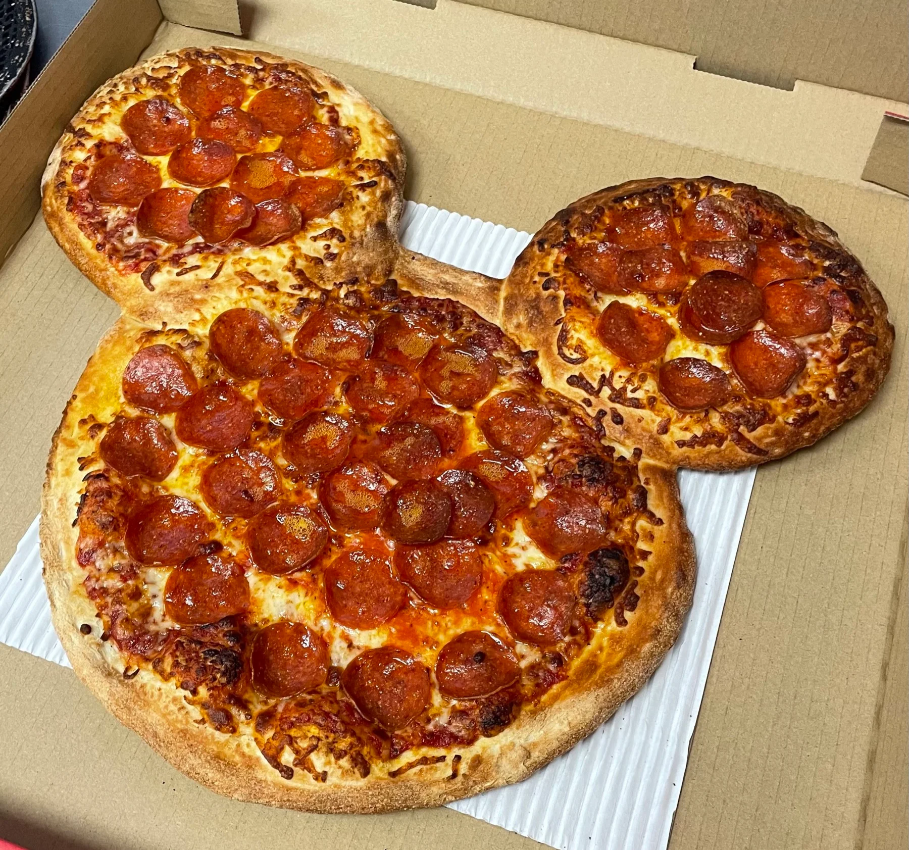 Character-shaped pepperoni pizza, The Happiest Pizza on Earth, at Stadium Pepz