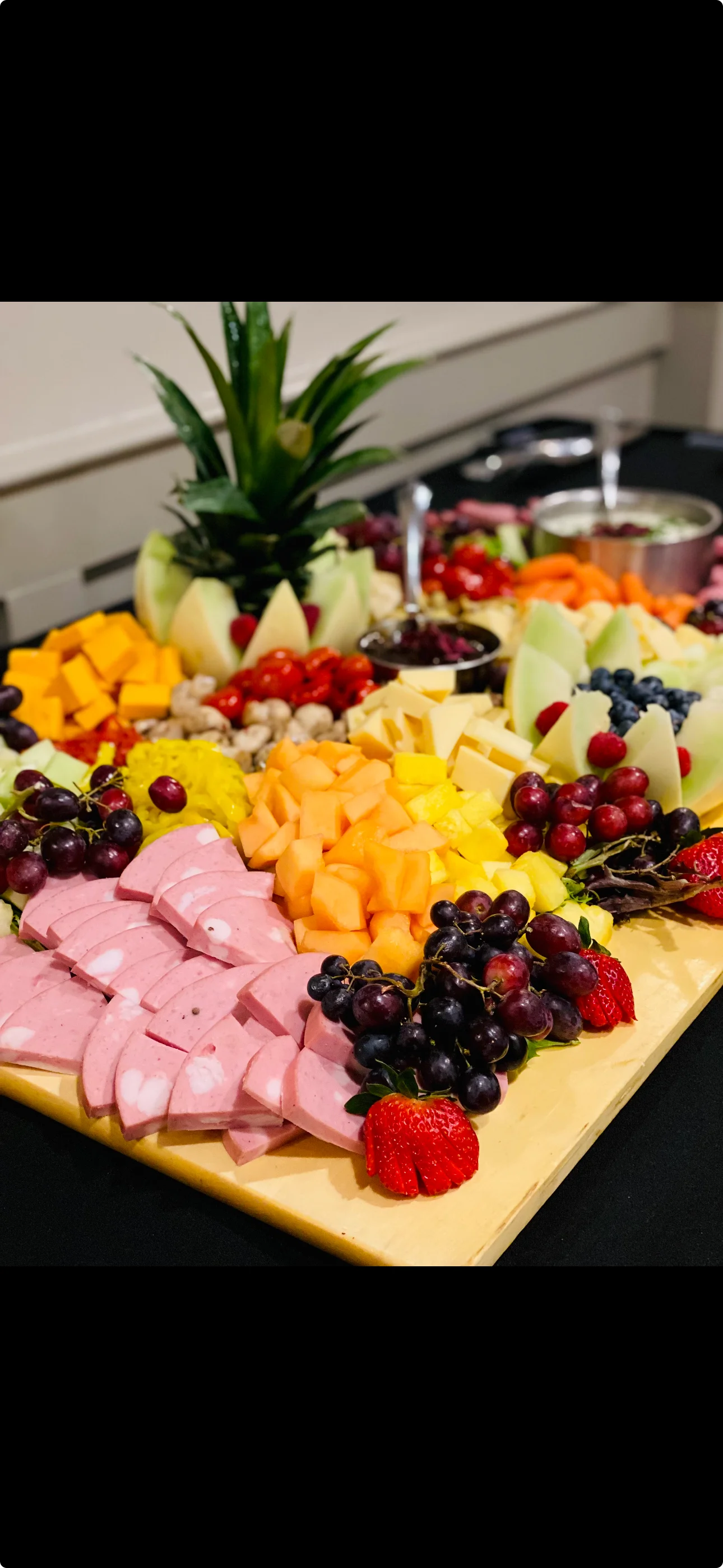 Colorful fruit and cheese platter for a festive gathering