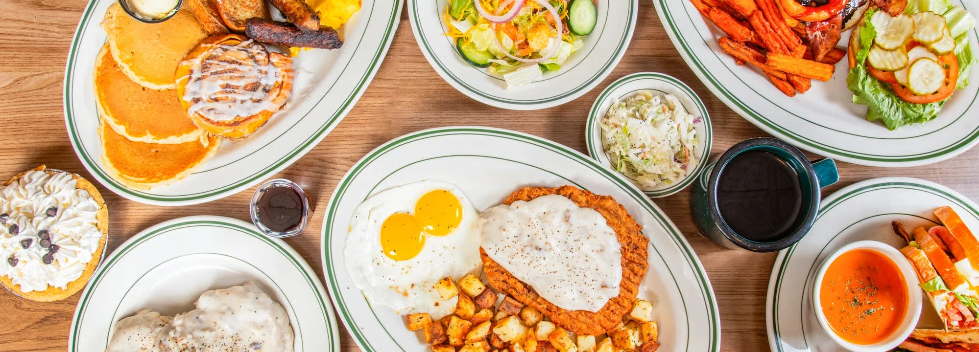 Classic American breakfast platter with pancakes and eggs