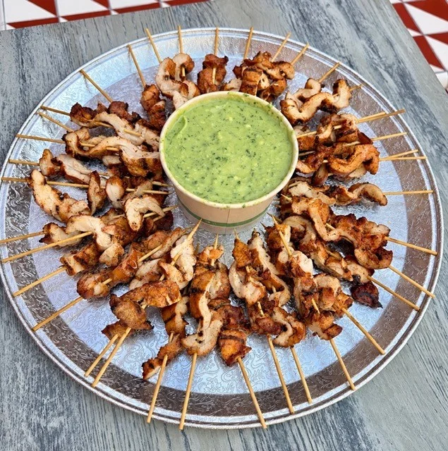 Spicy chicken skewers with peanut sauce