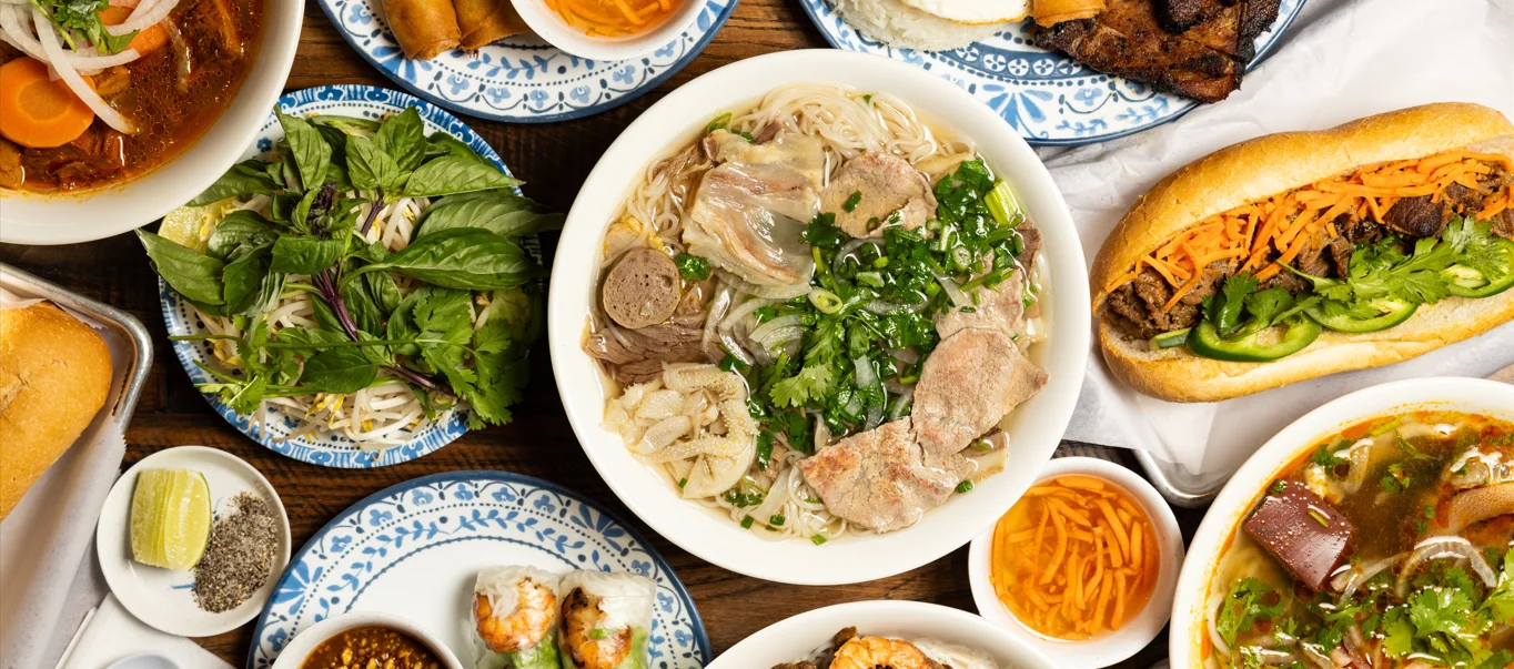Vietnamese pho with assorted meats and fresh herbs
