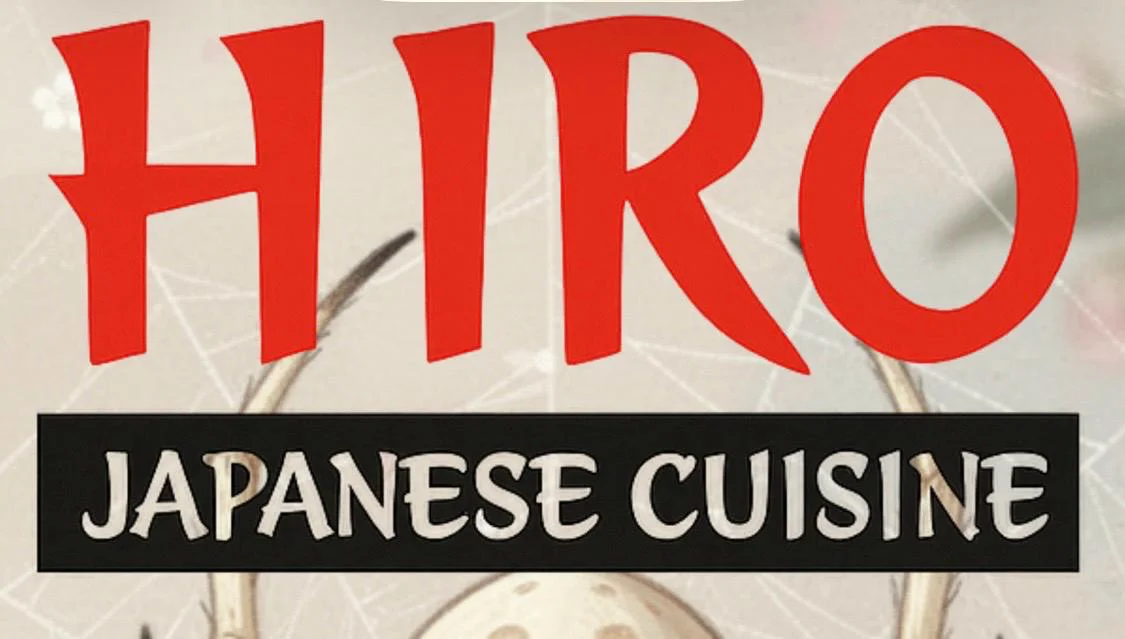 A vibrant graphic displaying the name of a Japanese cuisine restaurant, featuring bold red and black lettering.