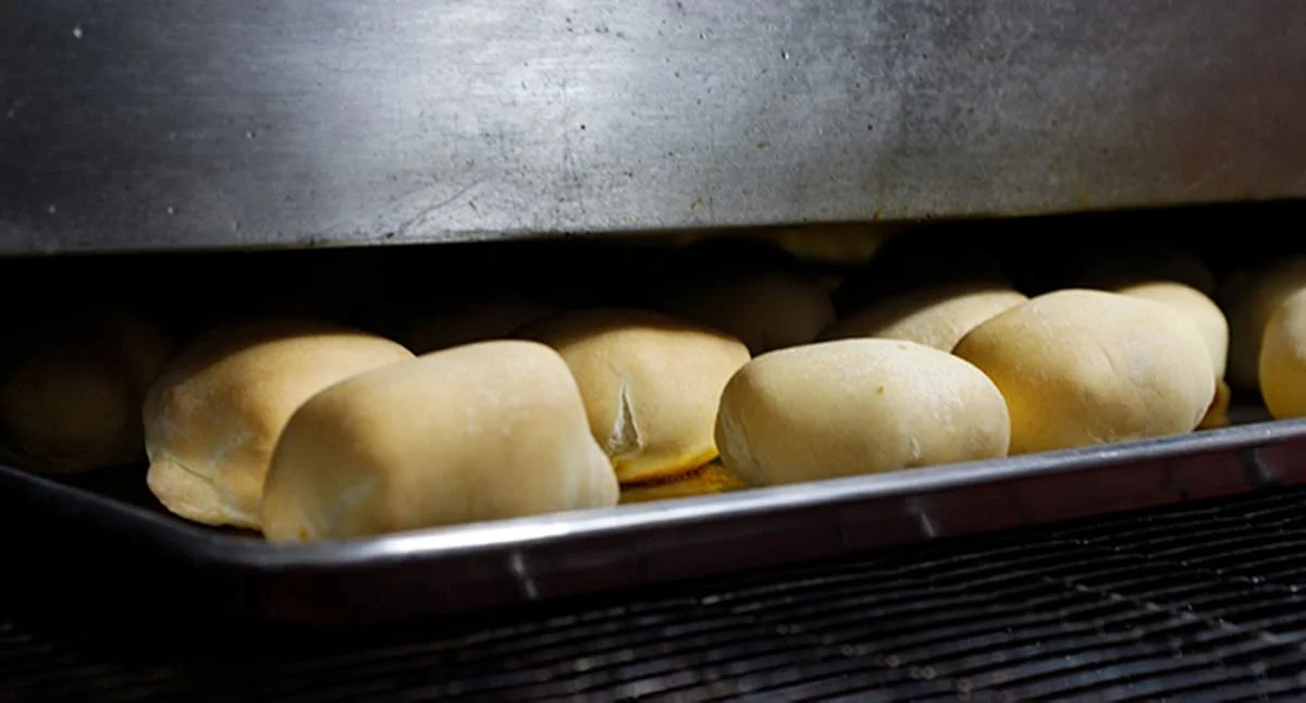 Freshly baked dinner rolls in a restaurant oven
