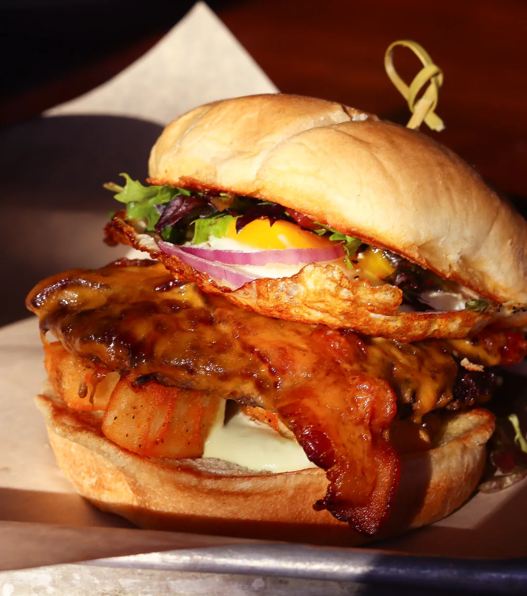 Delicious Hawaiian burger with bacon and fried egg