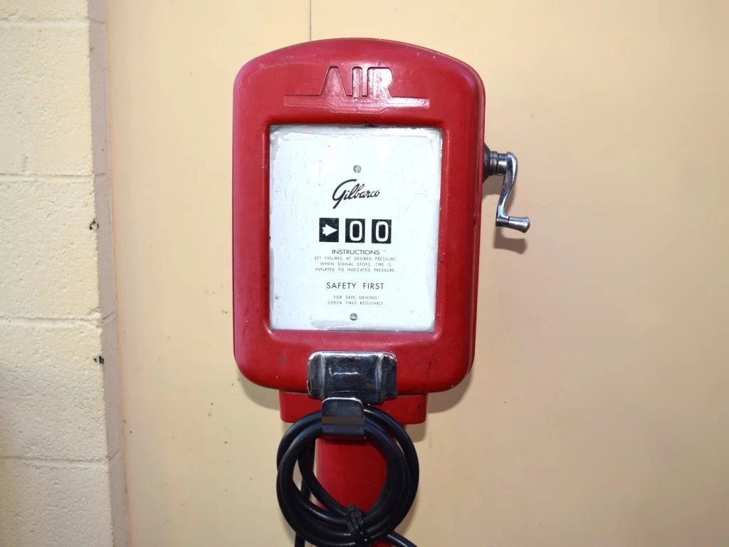 Vintage red air pump with instructions