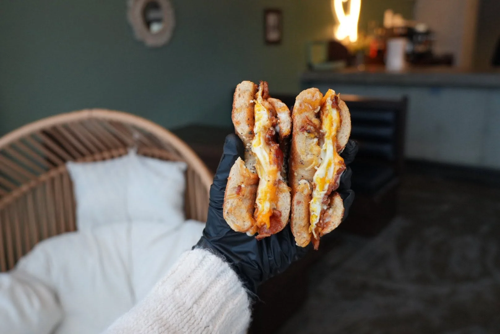 Cheesy grilled sandwich served in a cozy cafe setting