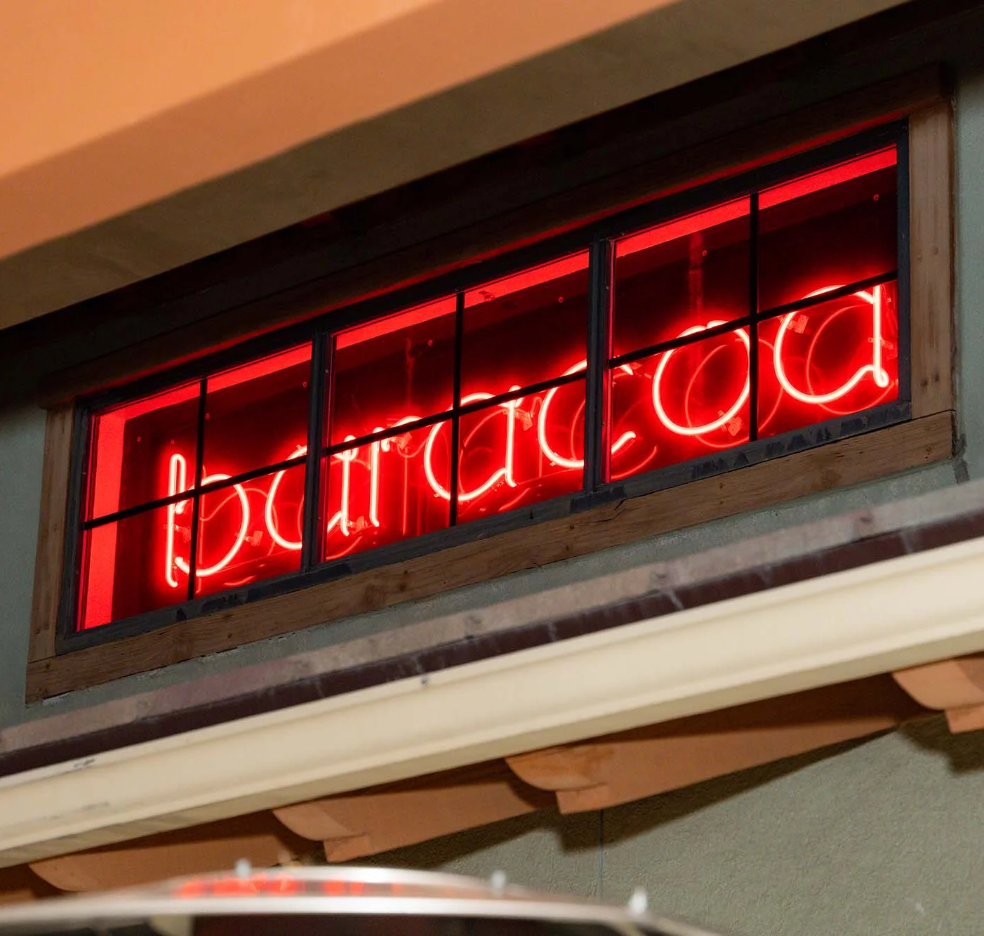 Neon Baracoa Sign on restaurant patio