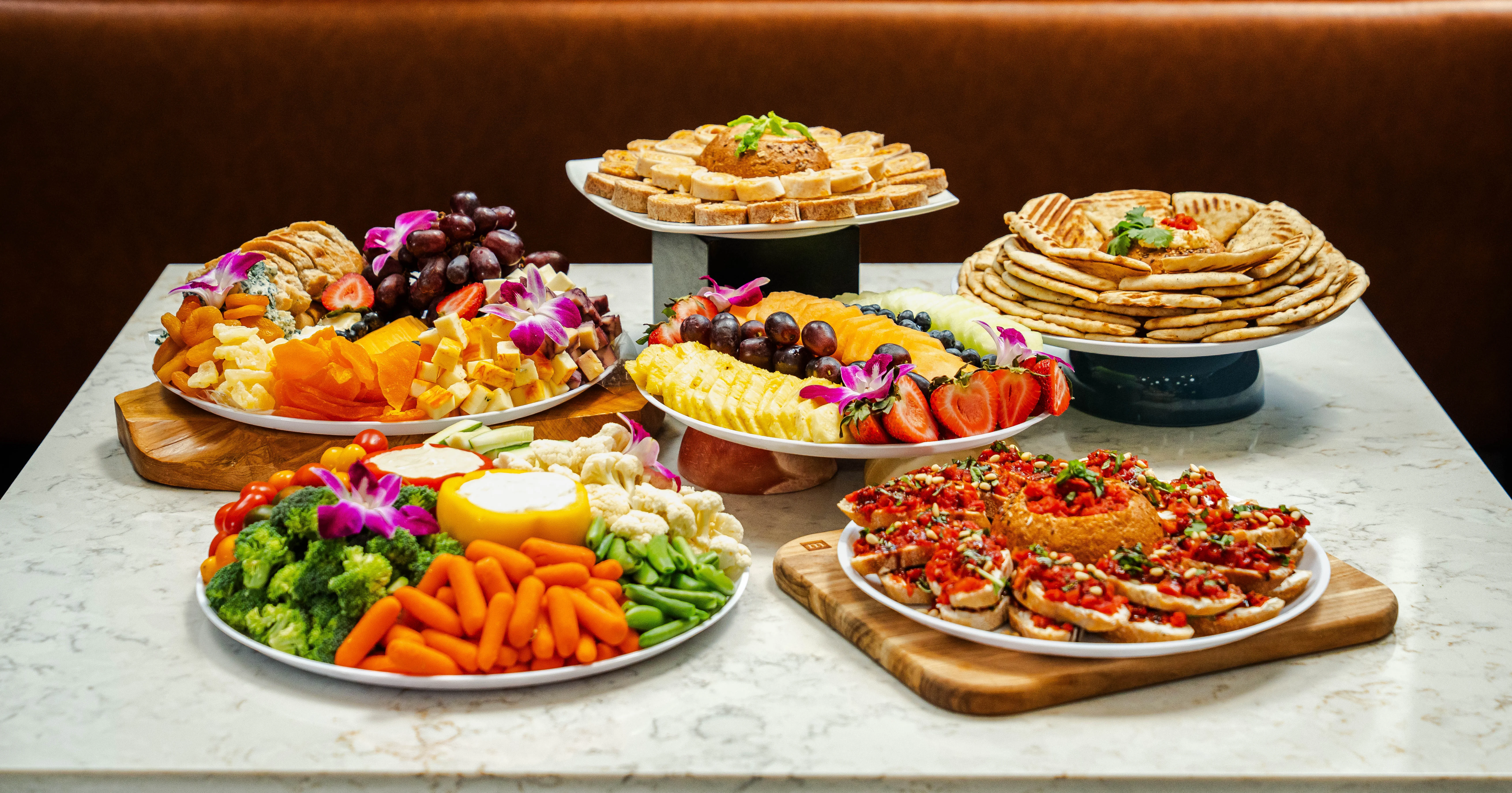 Delicious gourmet burger with fresh toppings on a wooden table