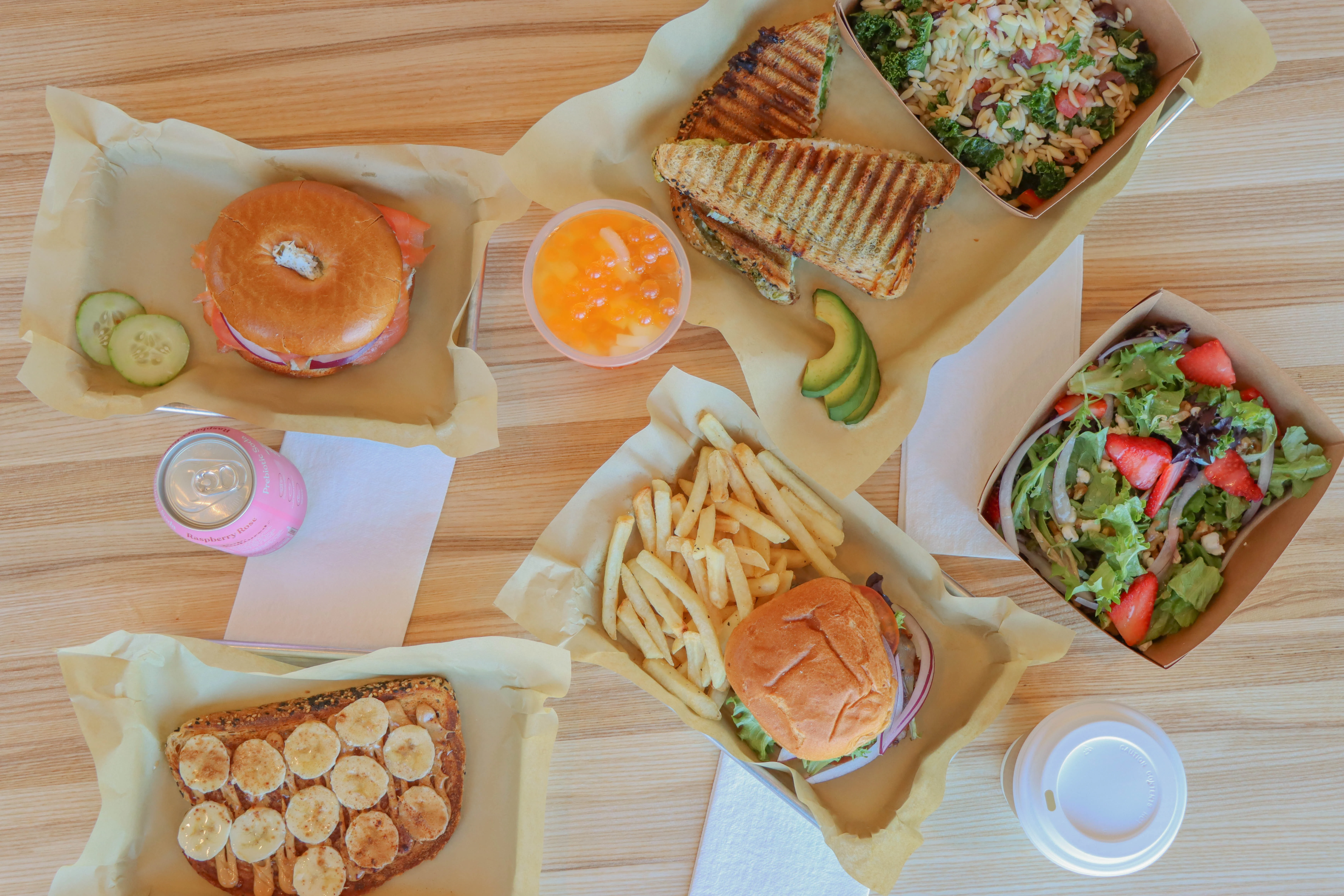 Flat Lay of Breakfast and Lunch Items in a Cafe