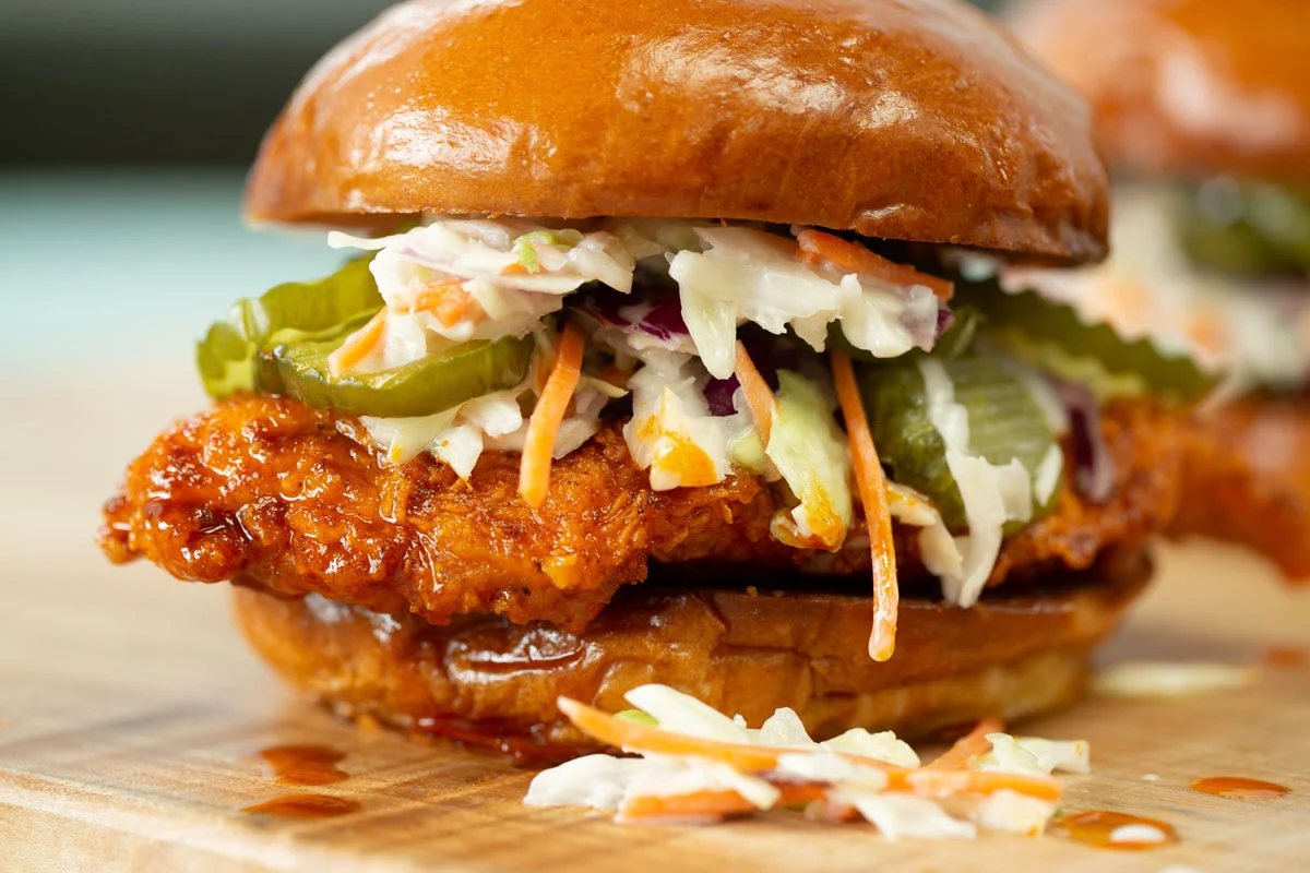 Crispy fried chicken sandwich with coleslaw and pickles