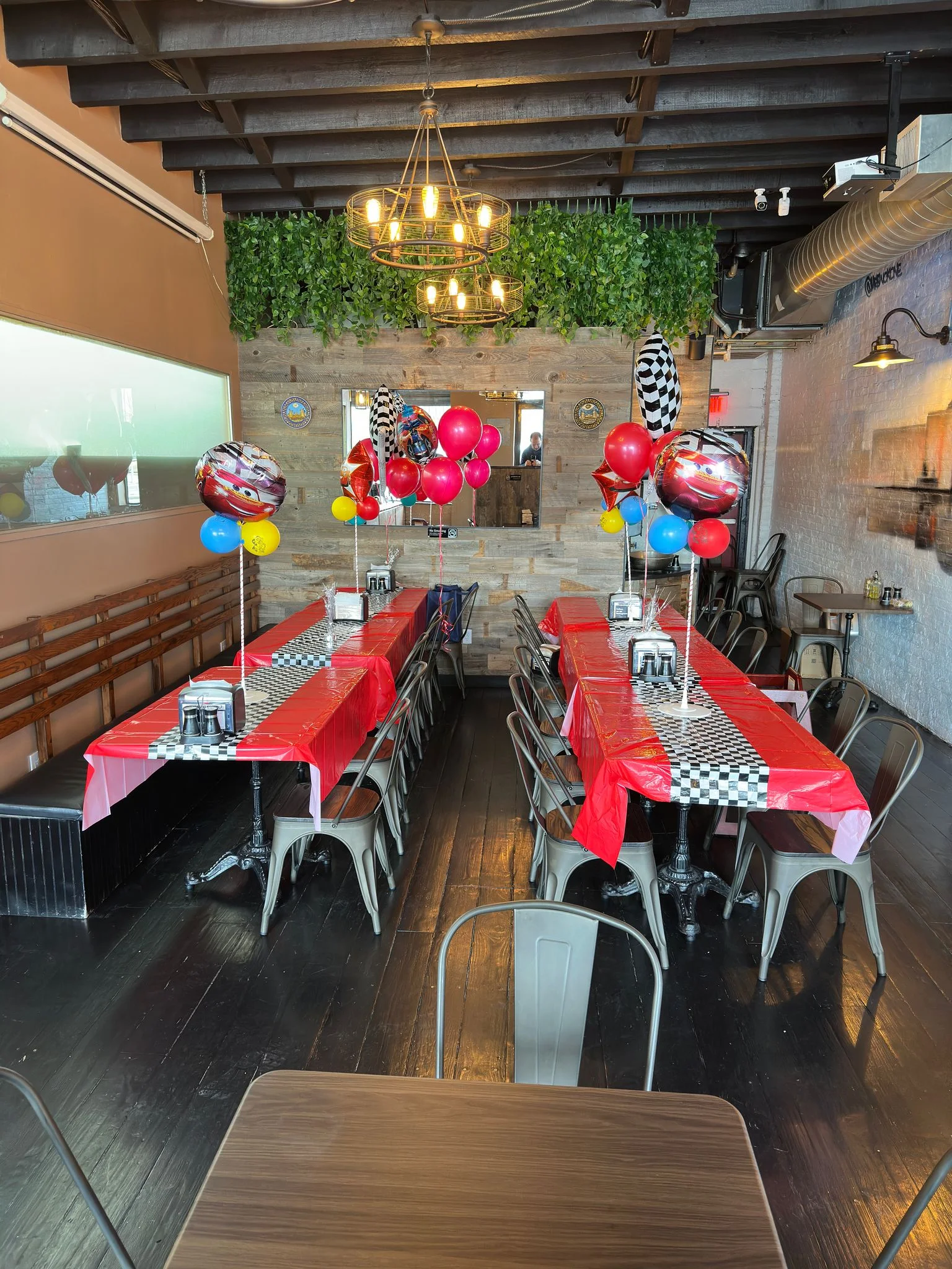 Private dining room decorated fir juds birthday party with balloons and festive table setup at Samarkand nights Brooklyn