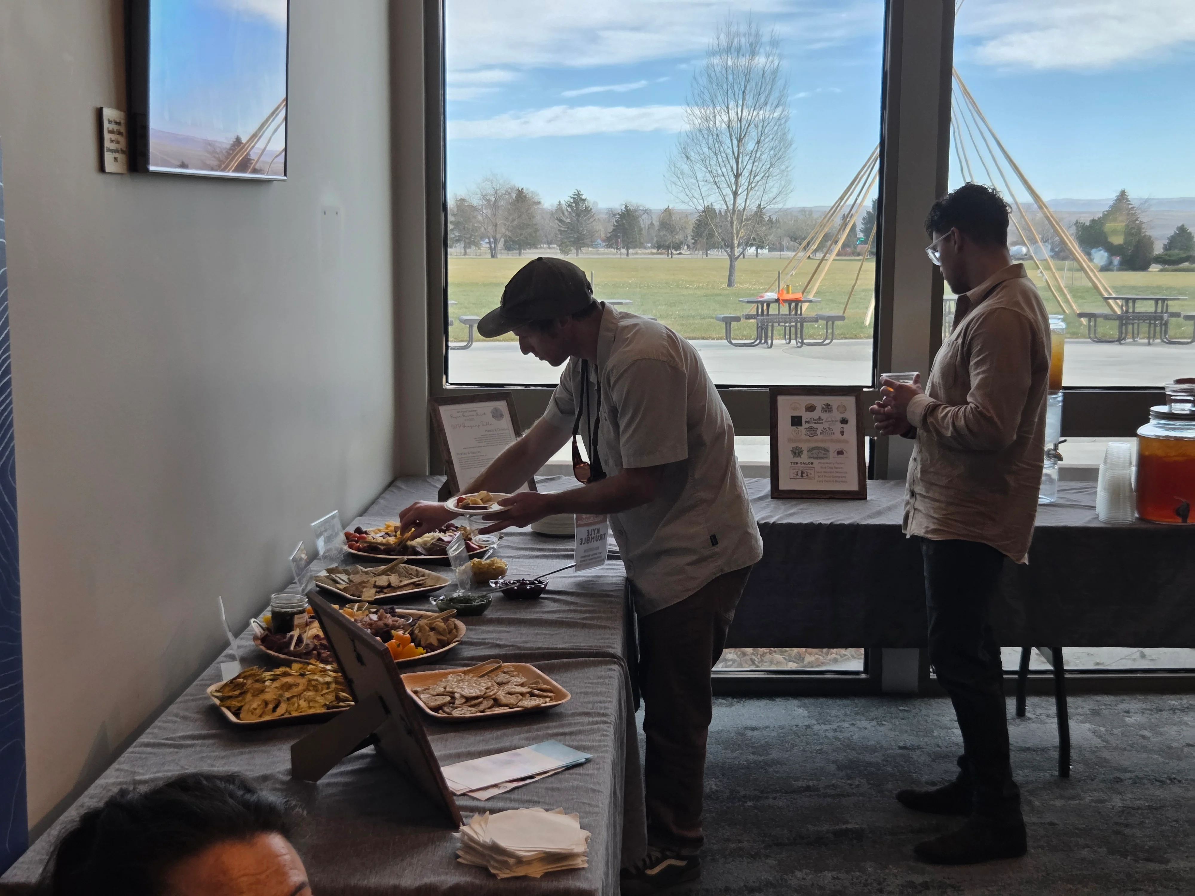 Guests enjoying a buffet with assorted appetizers at a gathering
