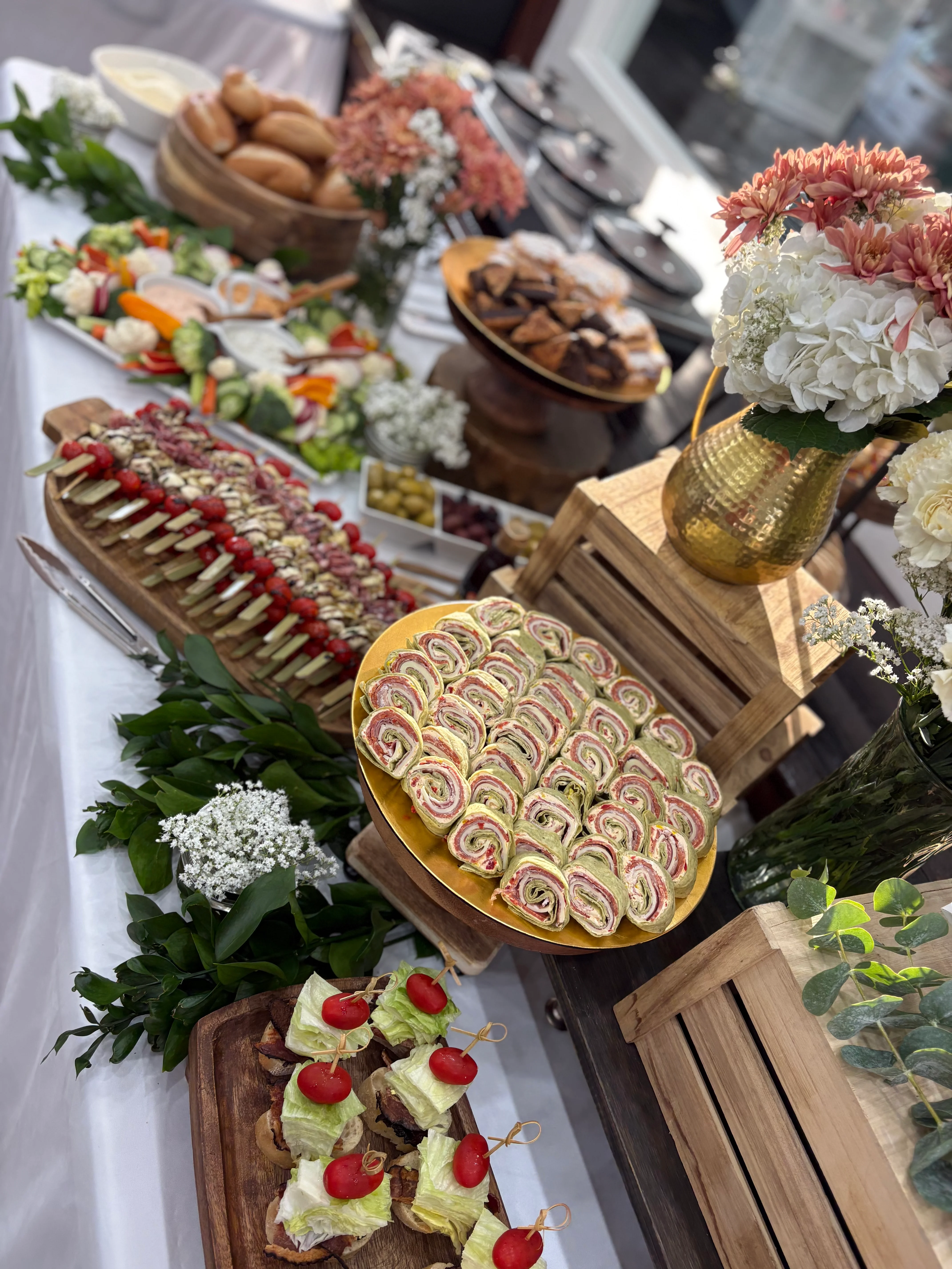 Assorted Mediterranean appetizers on a buffet table