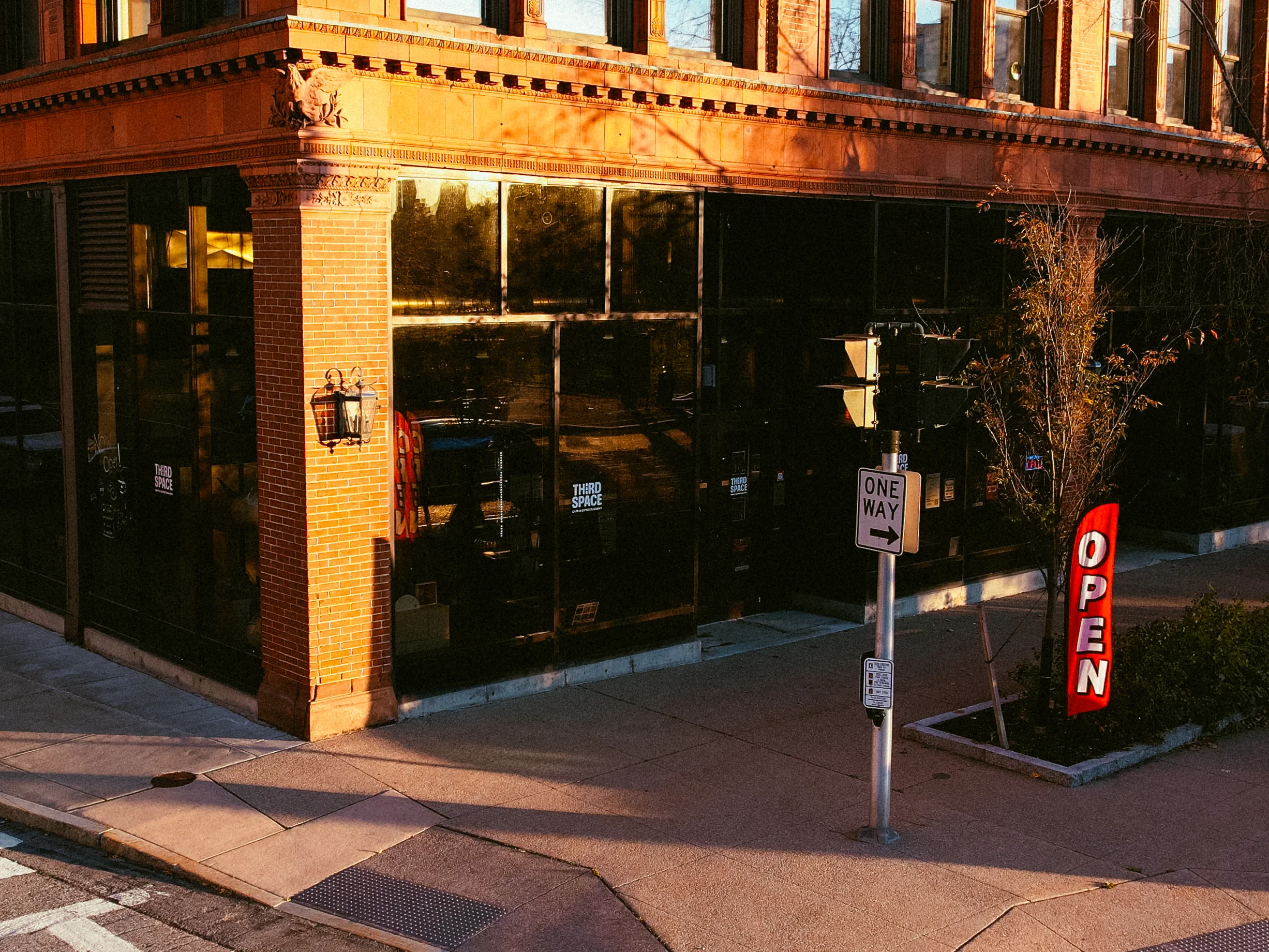 Charming restaurant exterior with open sign and vintage architecture