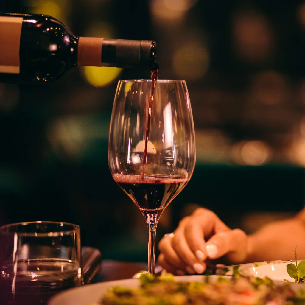 Casa Mia Wine Night promotional image featuring wine glasses and a cozy setting.
