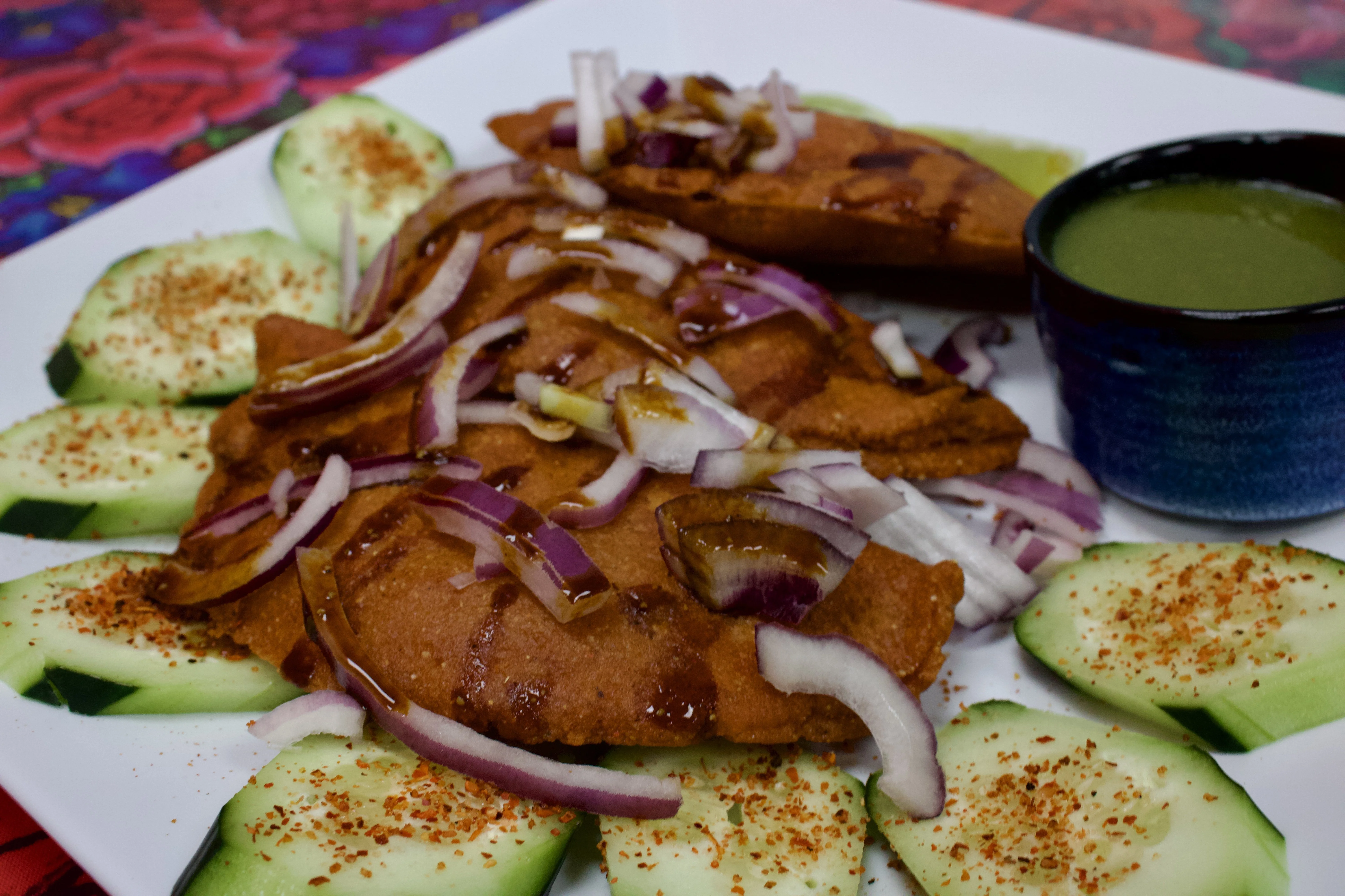 Crispy Indian kachori served with cucumber and green chutney