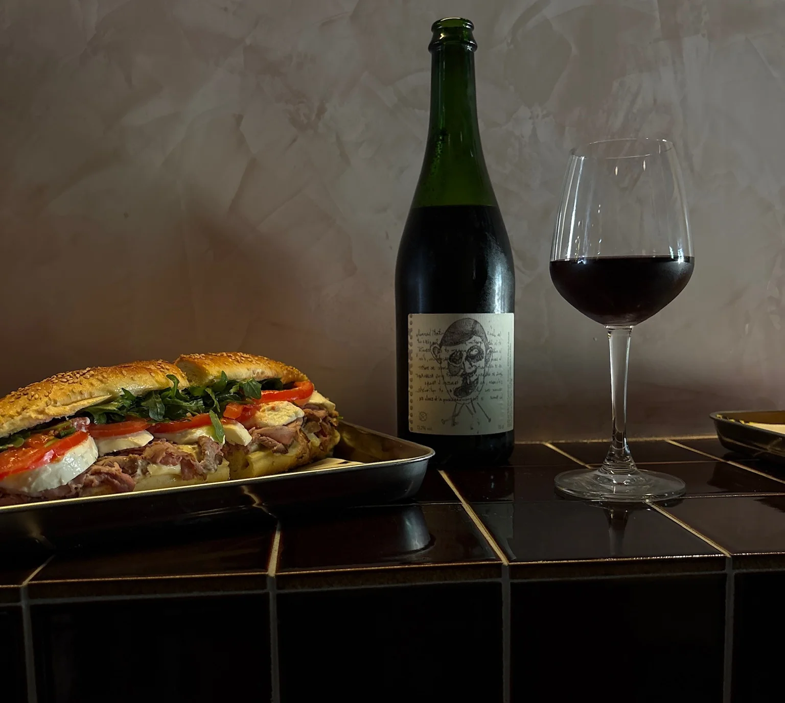 Gourmet sandwiches with wine in a modern restaurant setting