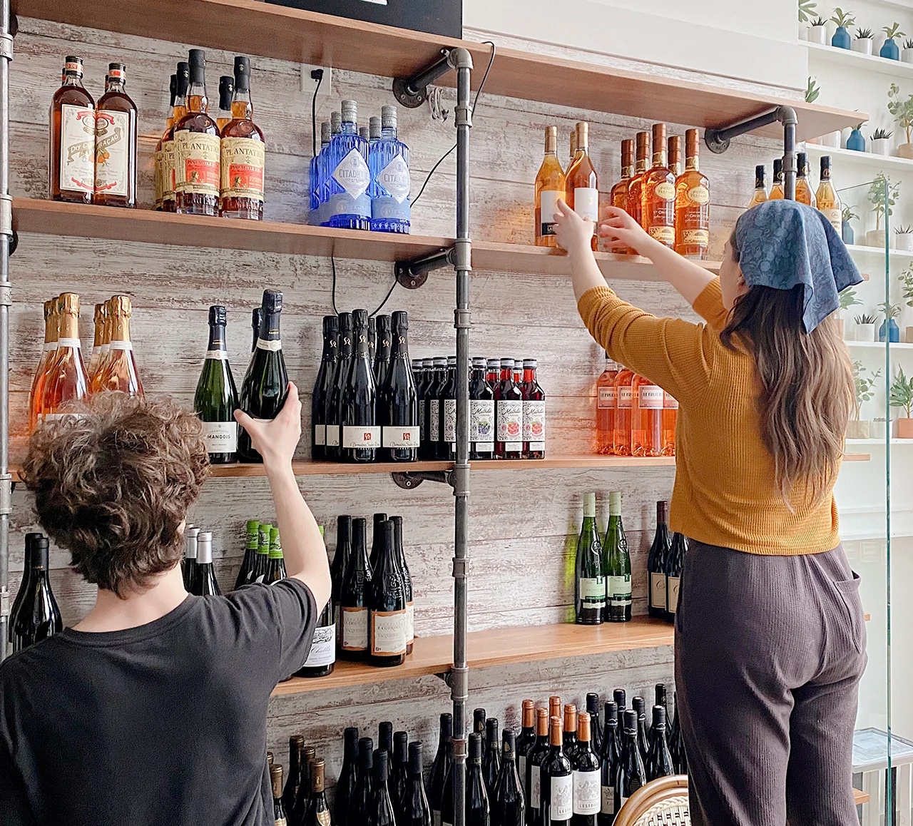 La Boulangerie & Co staff at Humboldt Park setting up wine display and preparing to welcome guests.