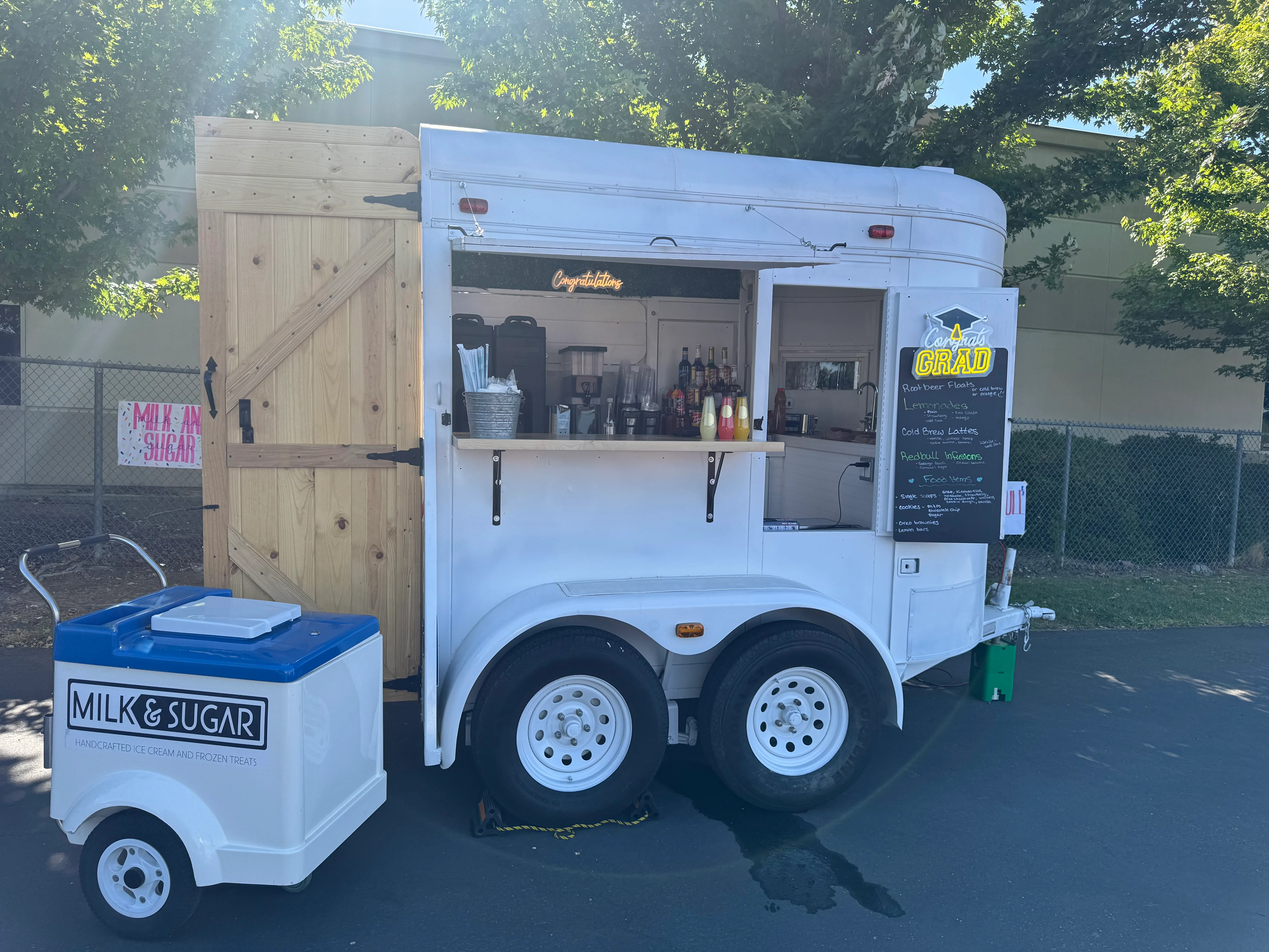 Mobile coffee and ice cream truck with menu board