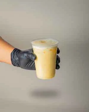 Iced coffee drink served in a clear cup