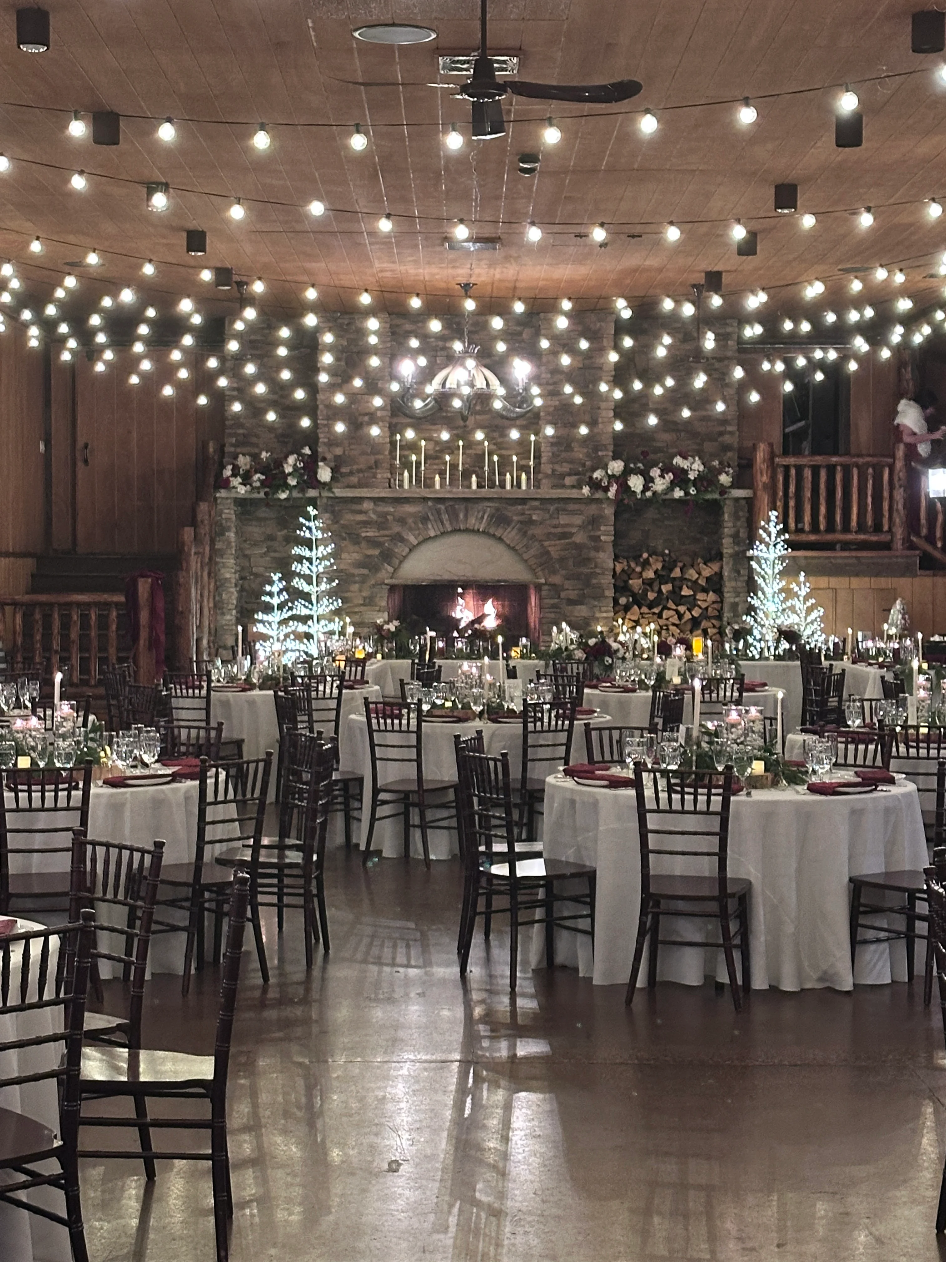 Elegant dining setup with festive decor and warm lighting