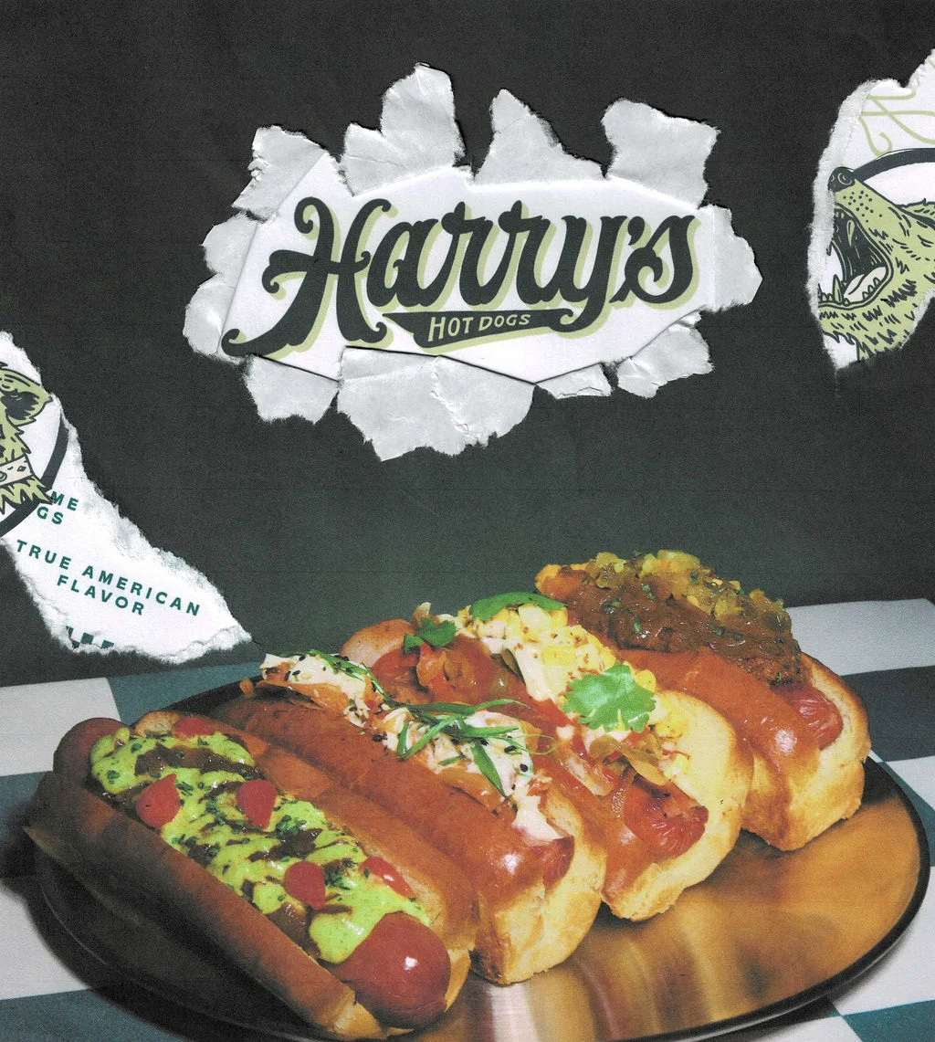 Artisan hot dogs on a platter at Harry's Hot Dogs