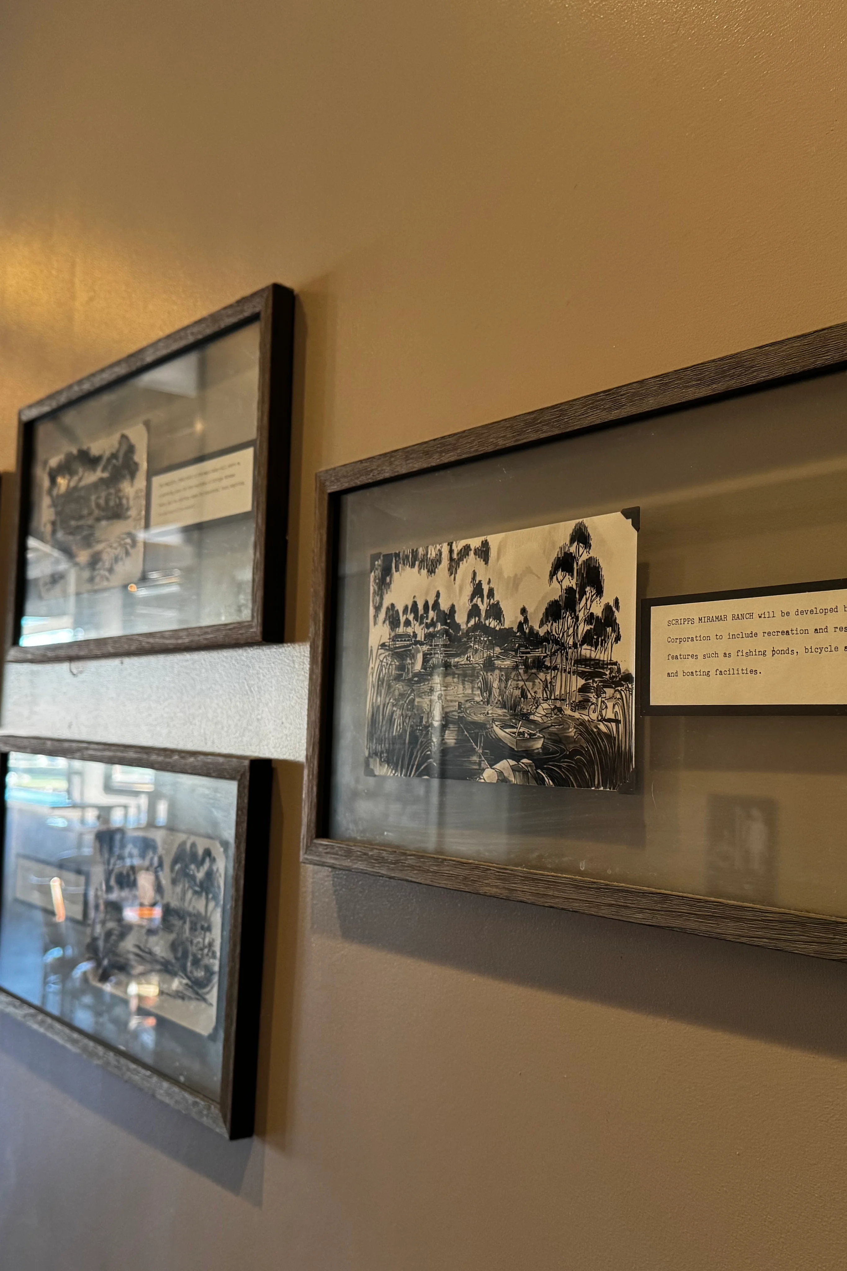 Artistic restaurant wall decor with framed historical images