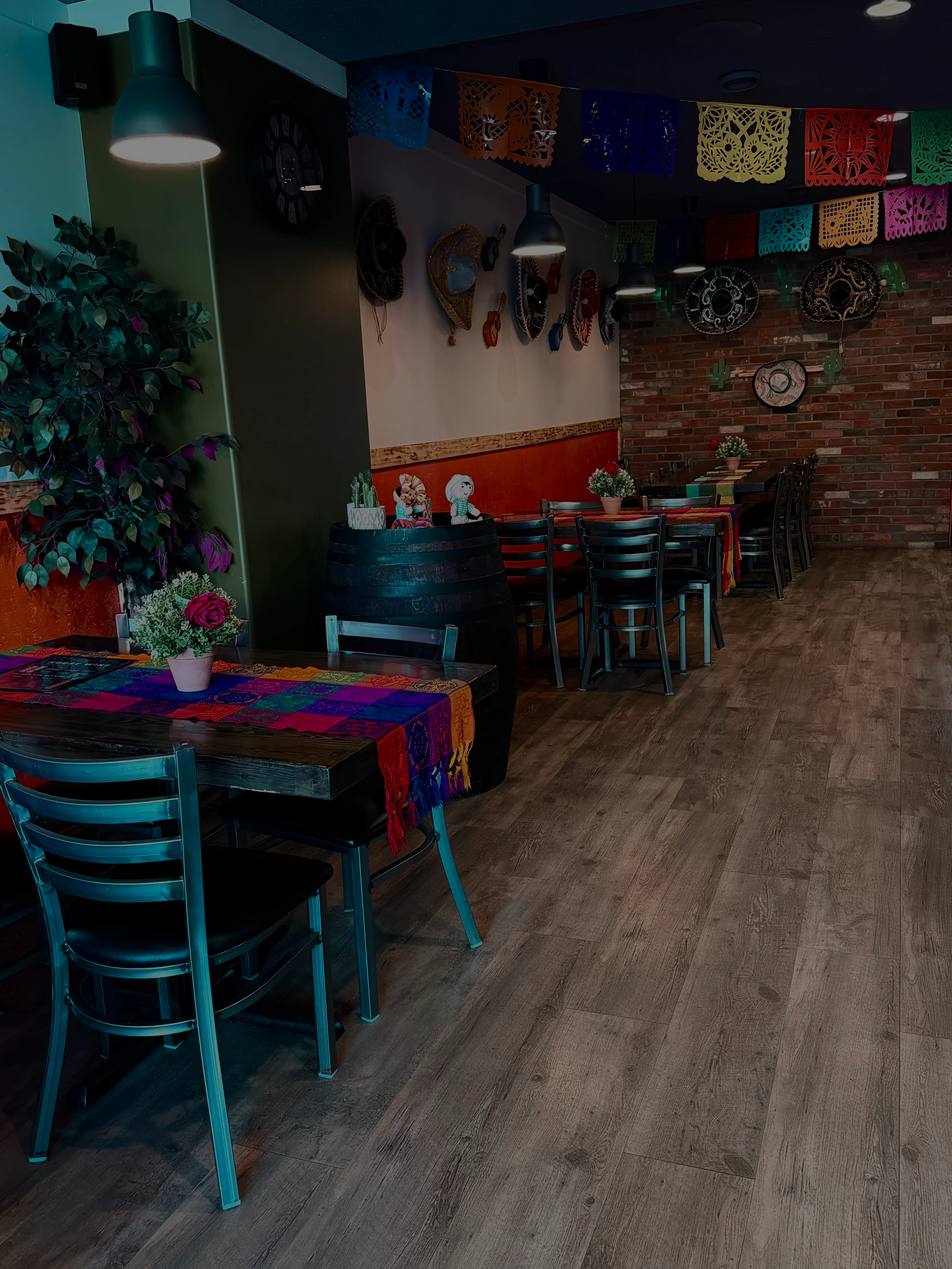 Cozy restaurant interior with colorful decor and wooden accents