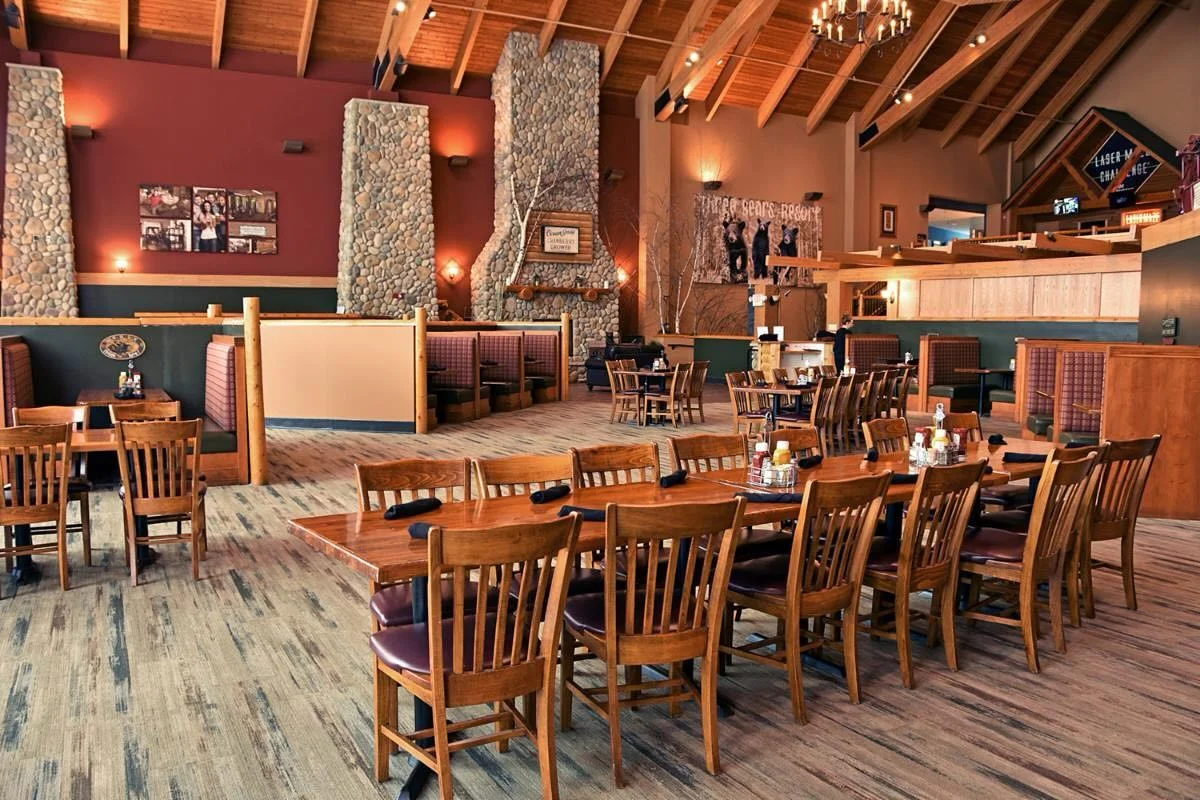Delicious gourmet burger with fresh toppings on a wooden table