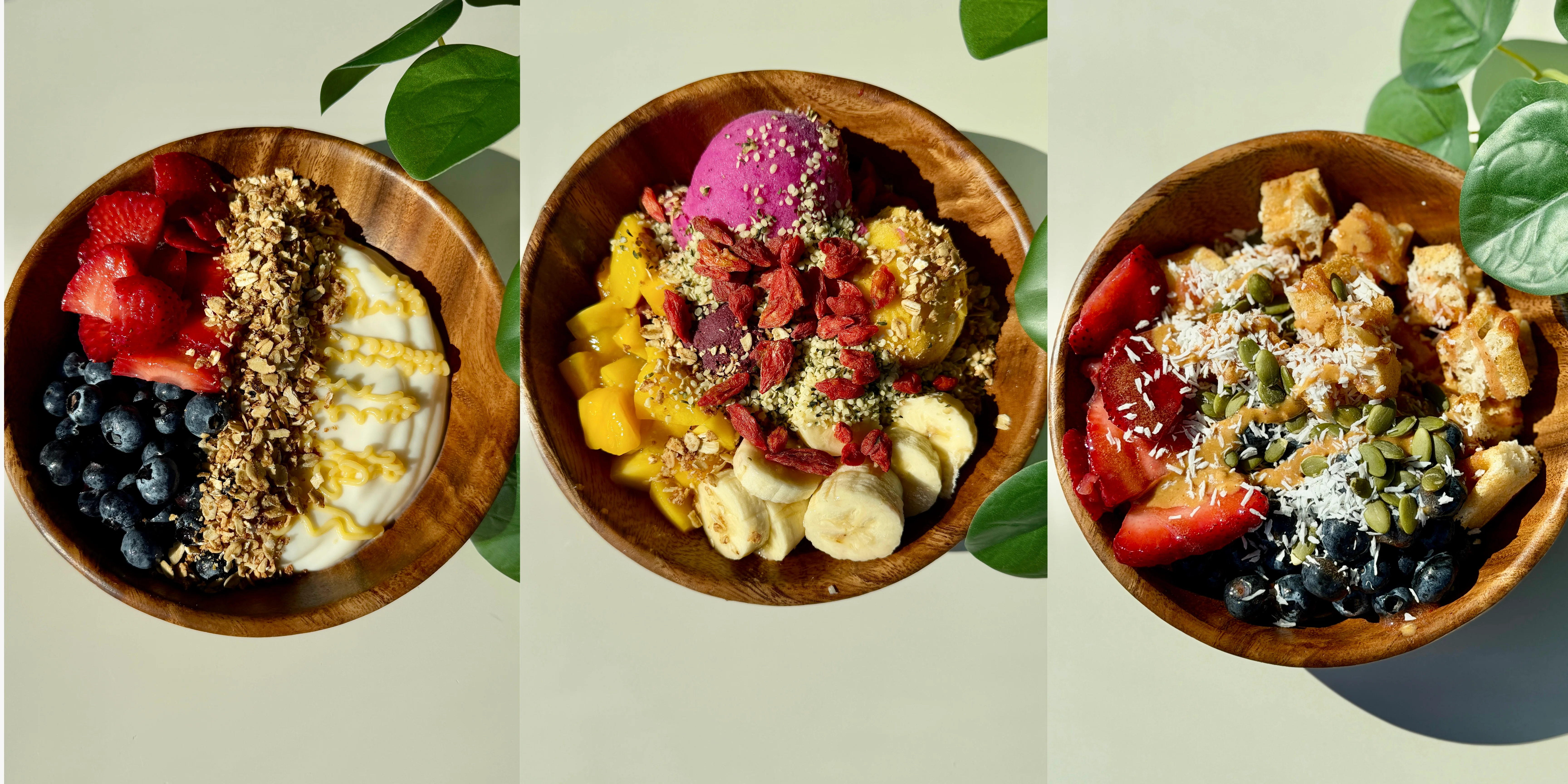 Colorful smoothie bowls with fresh fruits and granola