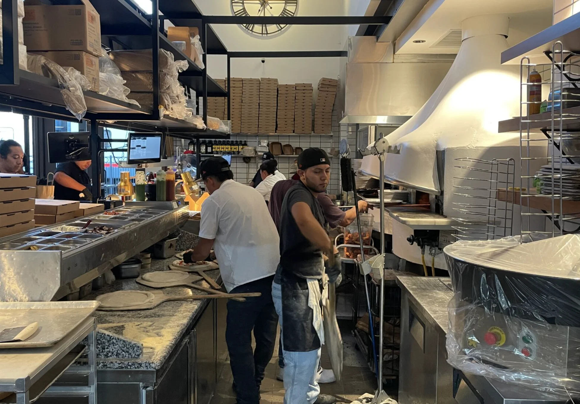 Delicious gourmet burger with fresh toppings on a wooden table