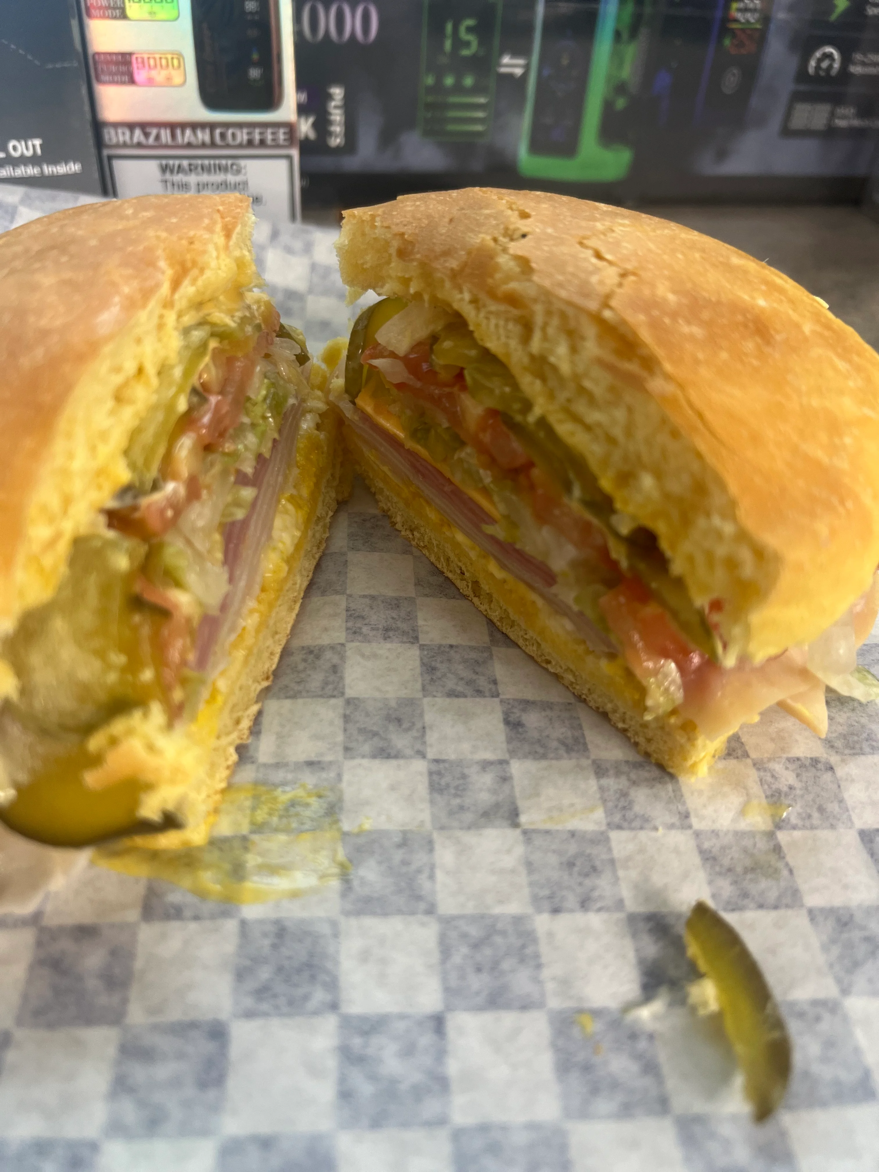Delicious Brazilian sandwich with layers of meats and fresh vegetables