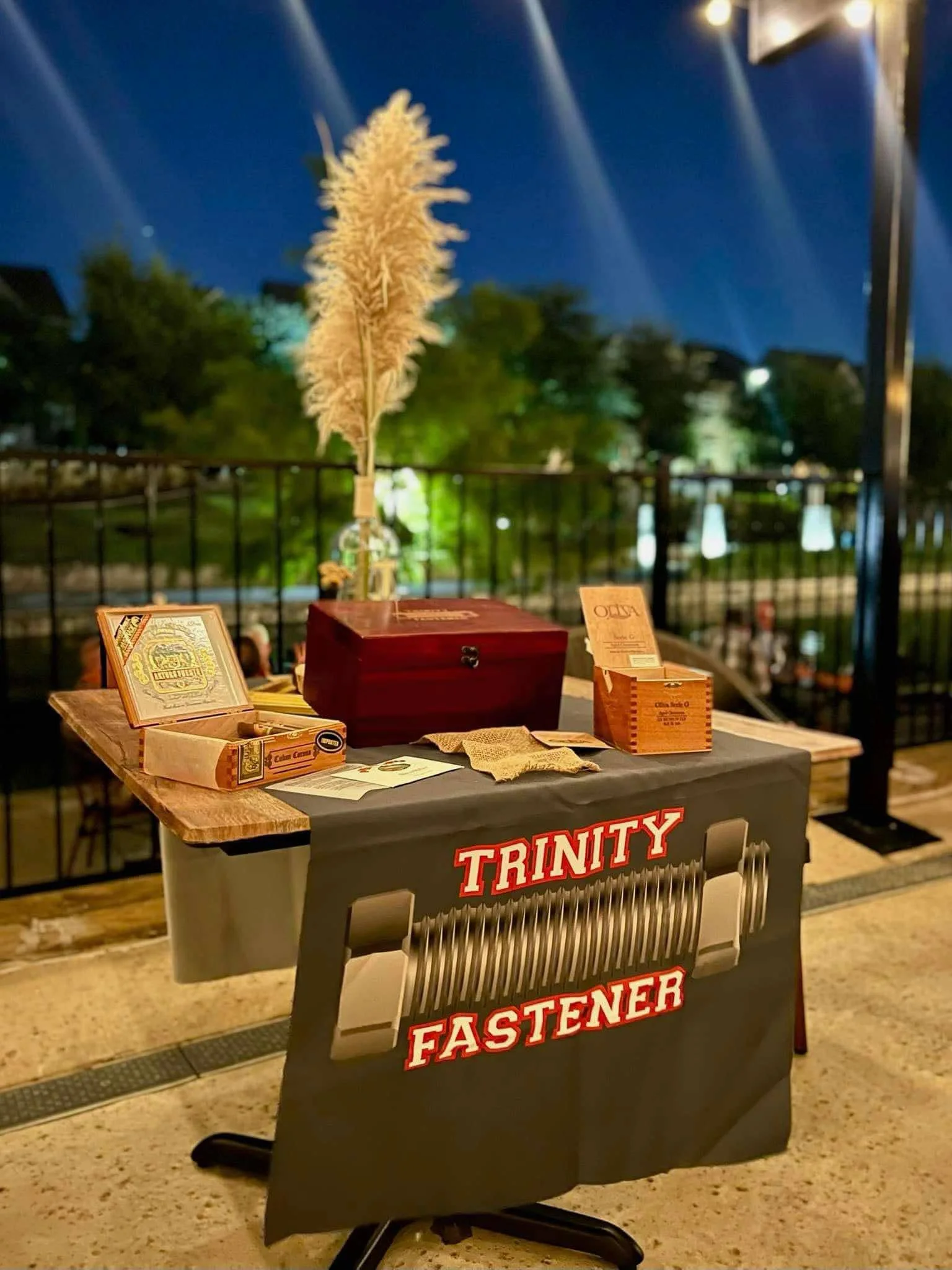 Decorative table setup for Trinity Fastener event at night