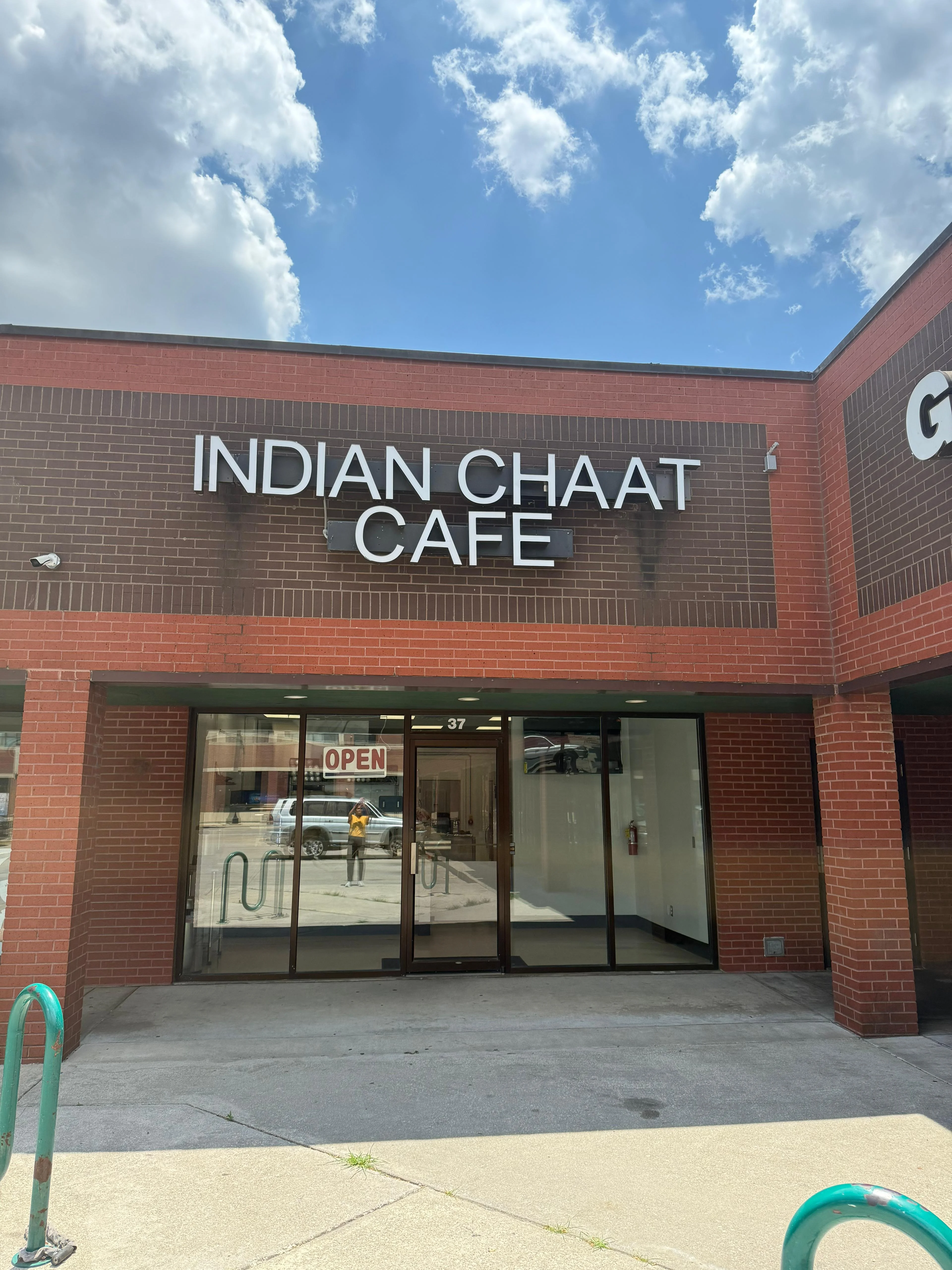 Exterior of Indian Chaat Cafe with open sign