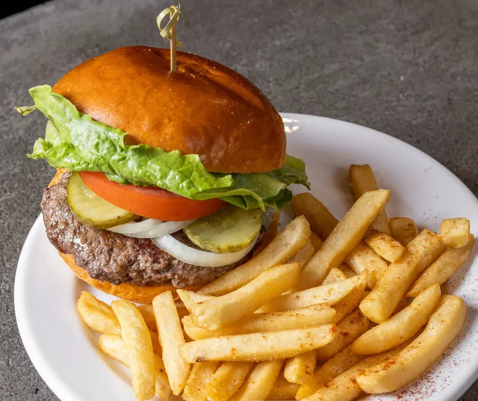 Classic American cheeseburger with fries