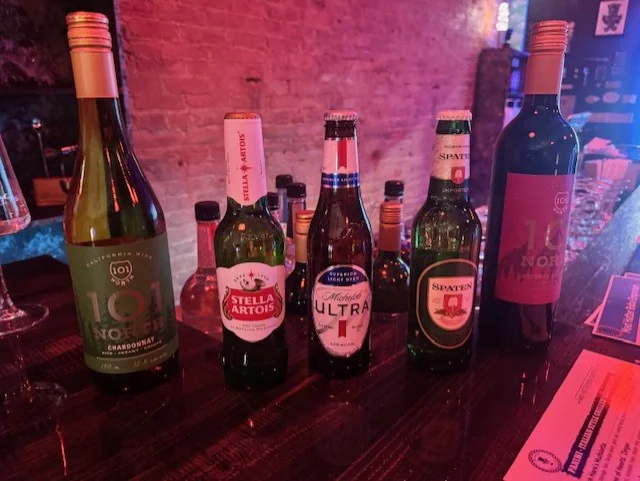Selection of wines and beers on a bar counter