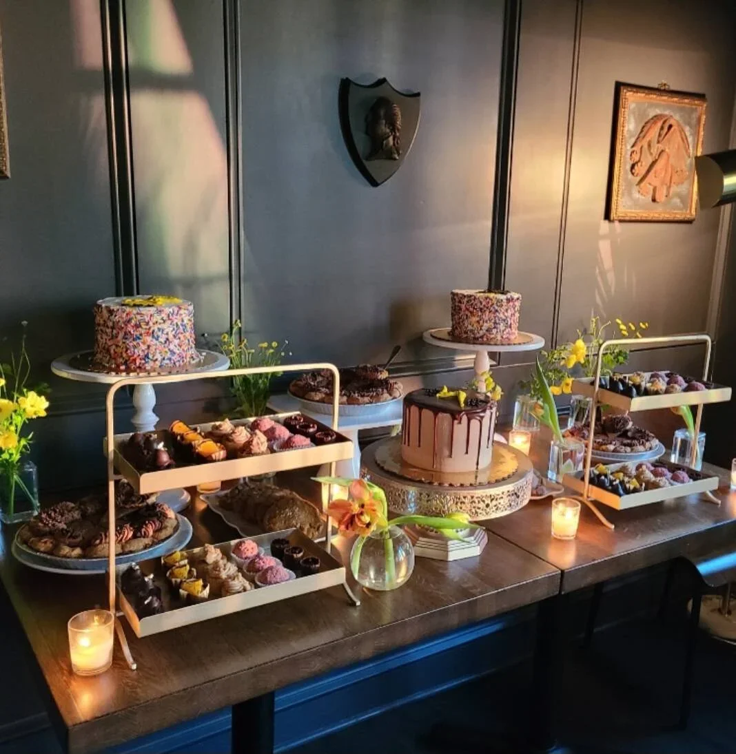 Elegant dessert display with assorted cakes and pastries
