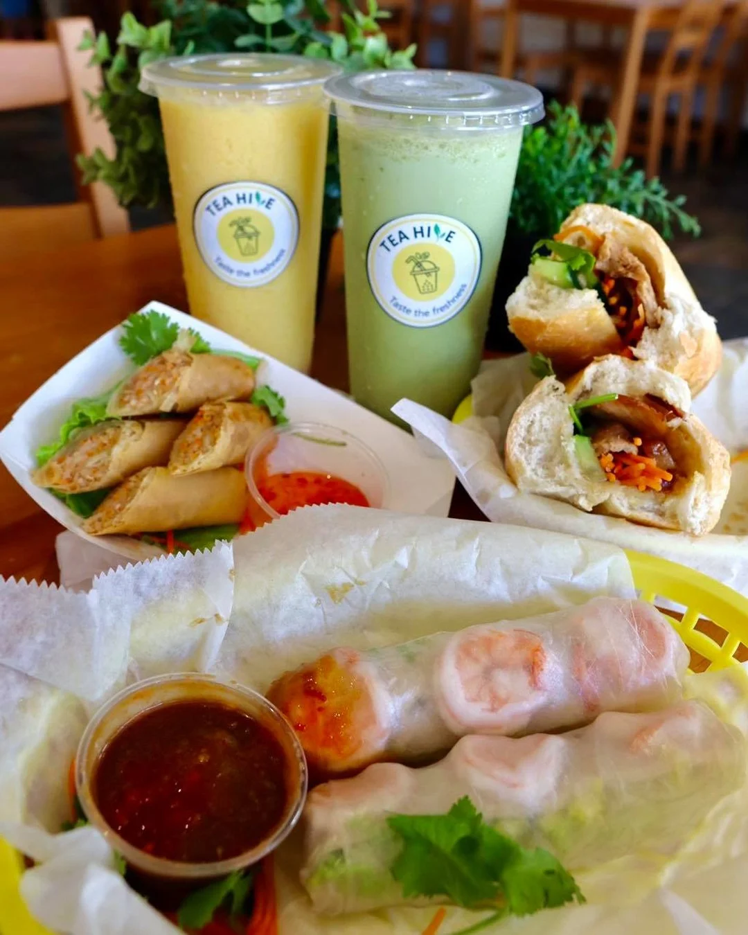 Vietnamese spring rolls with drinks in a cozy restaurant setting