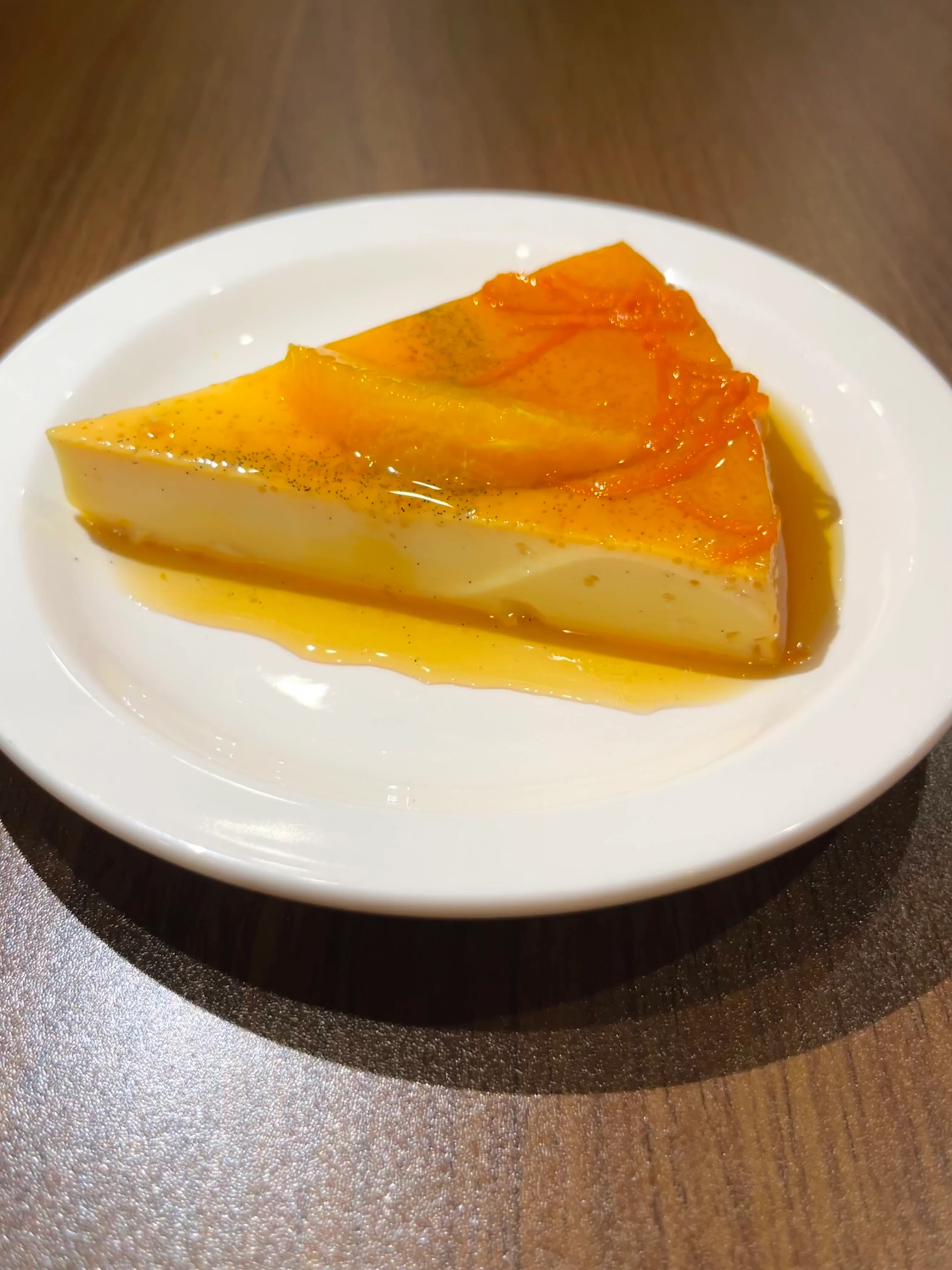 Creamy flan dessert with caramel sauce