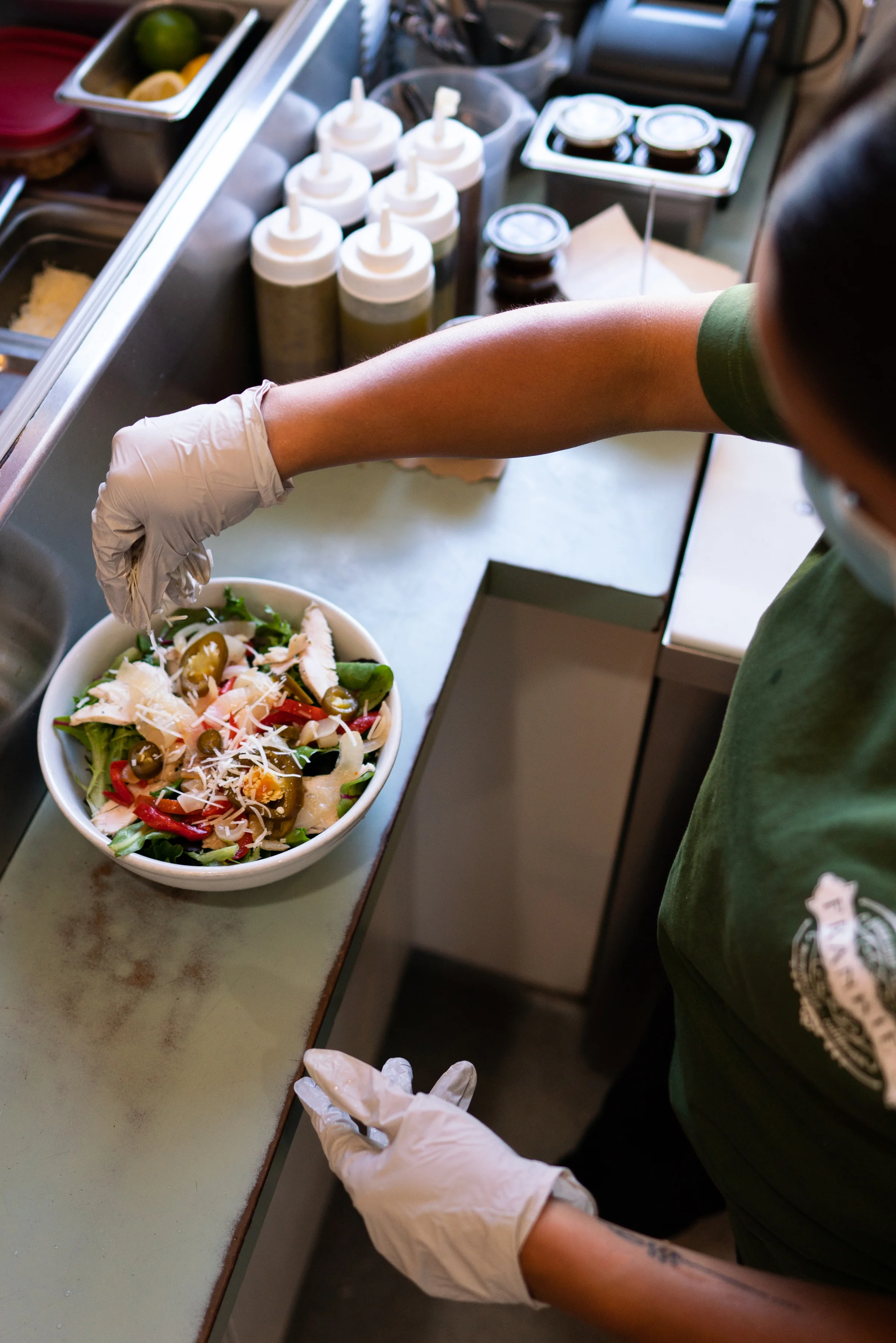 Fresh garden salad being prepared at Frankie's Pizza & Ice Cream in Mendocino Village